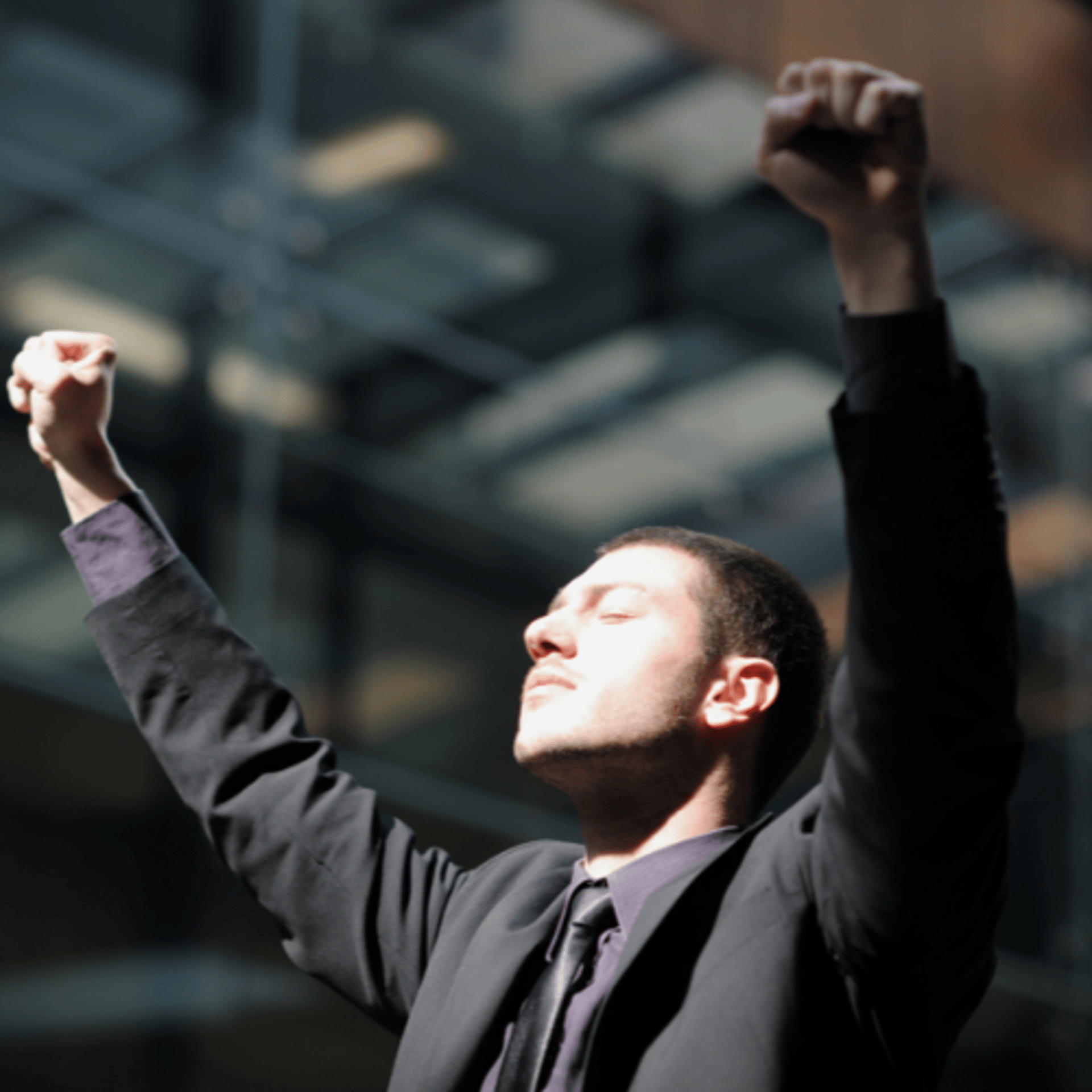 man holding incandescent bulb