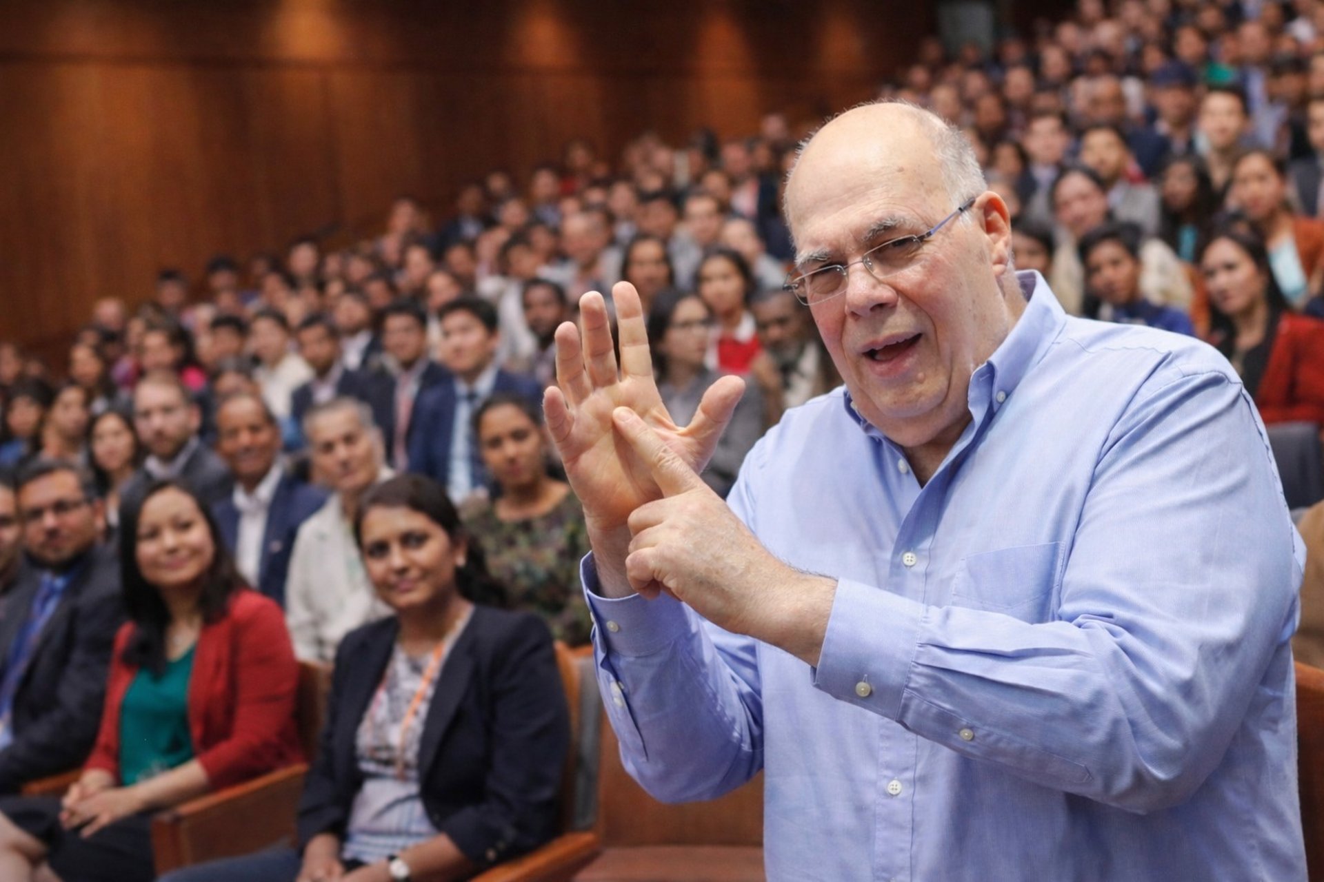 people sitting on chairs watching a game