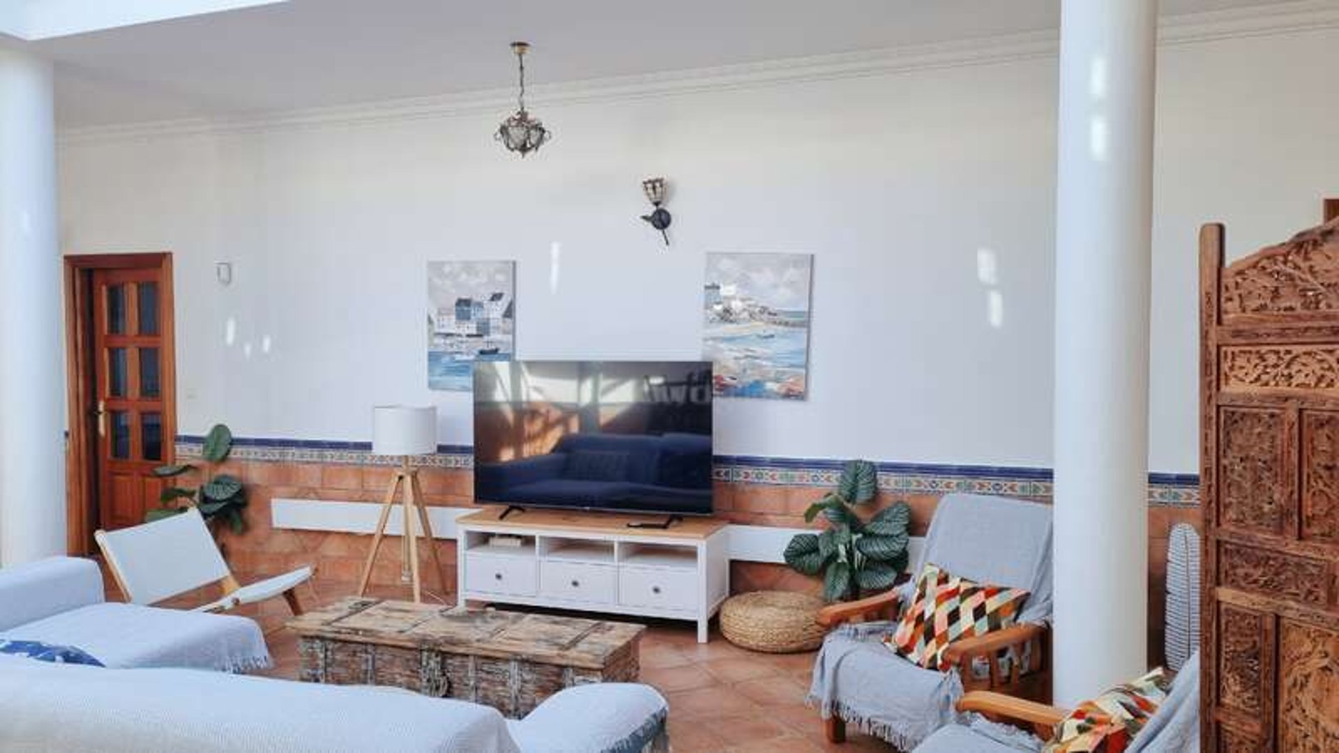 a very tall red building with lots of windows