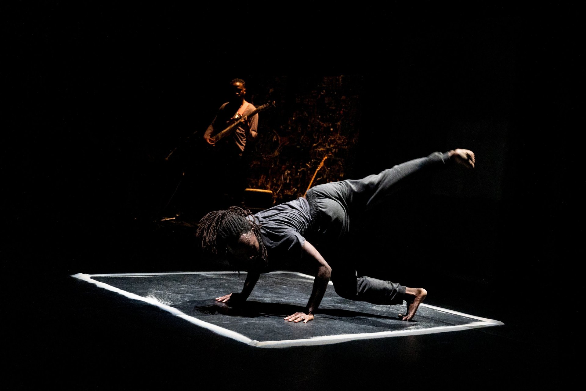an abstract photo of a curved building with a blue sky in the background