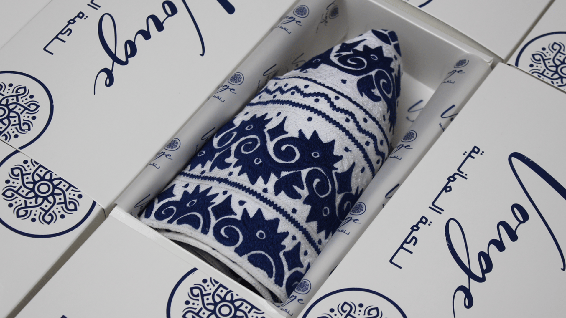 an abstract photo of a curved building with a blue sky in the background