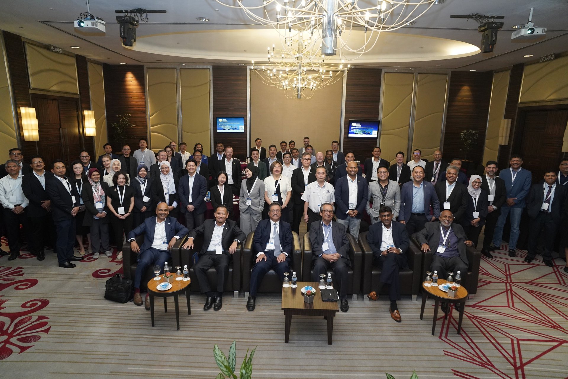 black and brown leather padded tub sofa