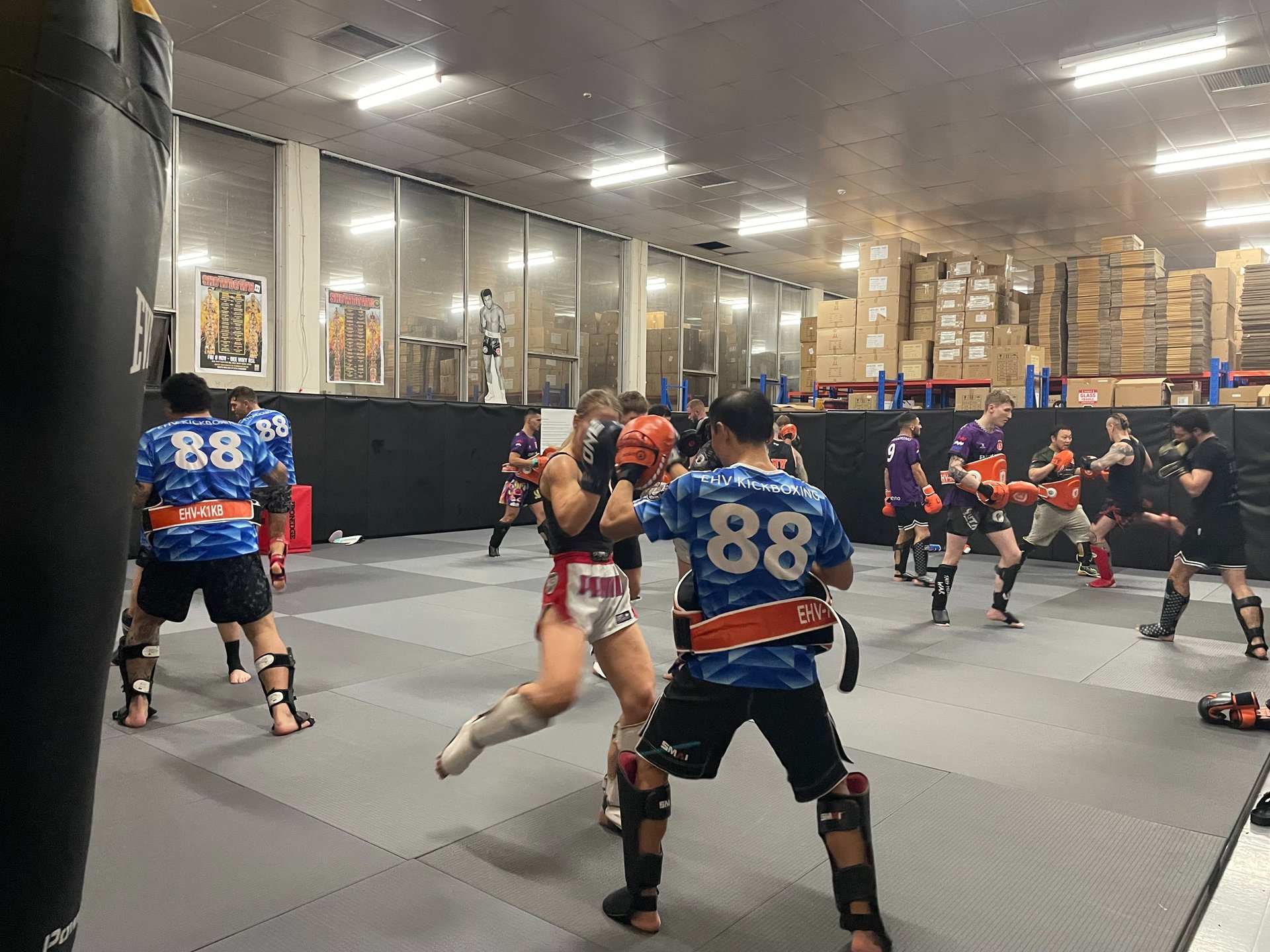 an abstract photo of a curved building with a blue sky in the background