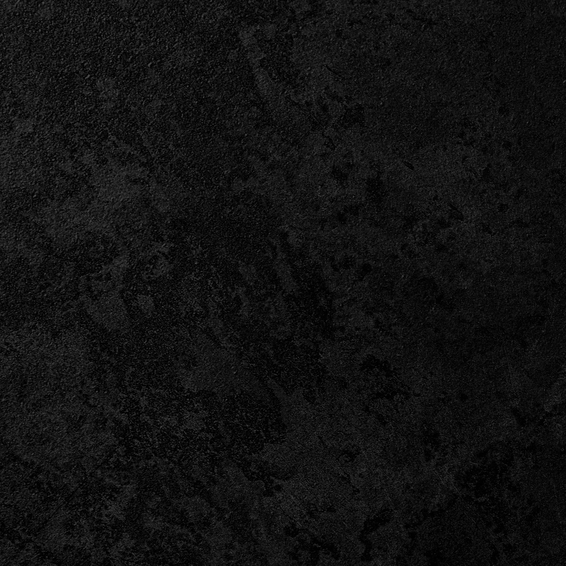 a black and white photo of a dark background