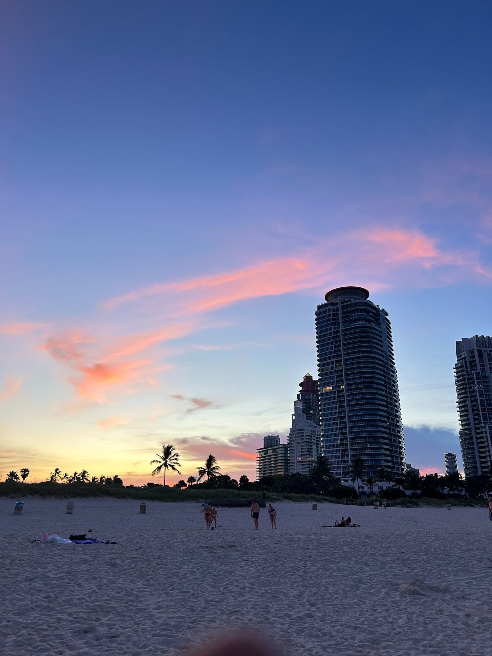 woman wearing yellow long-sleeved dress under white clouds and blue sky during daytime
