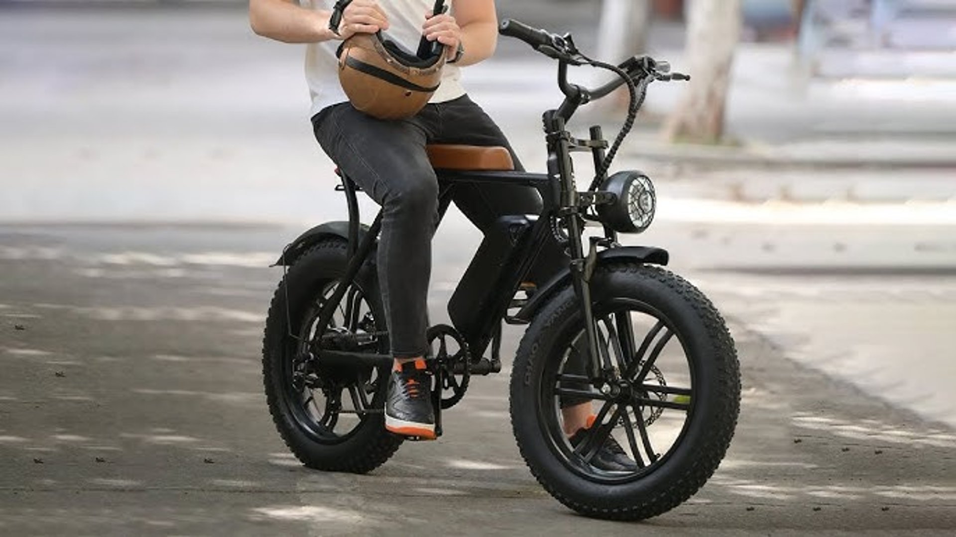an abstract photo of a curved building with a blue sky in the background
