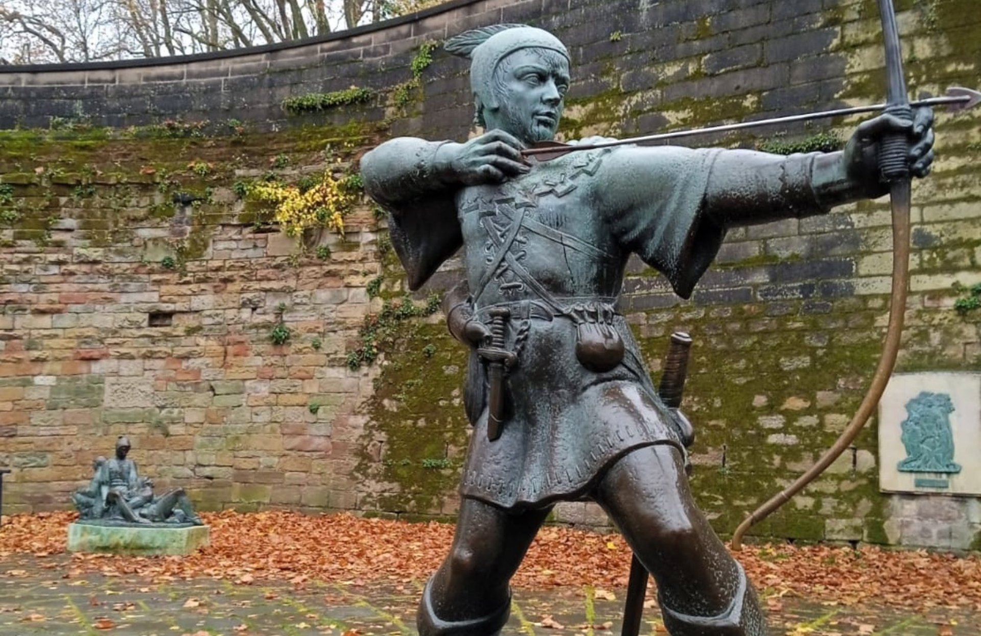 black and brown leather padded tub sofa