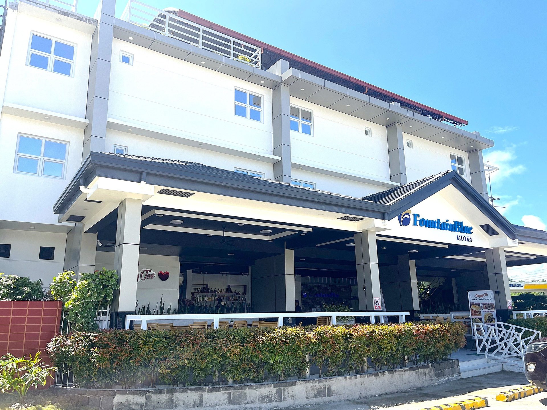 black and brown leather padded tub sofa