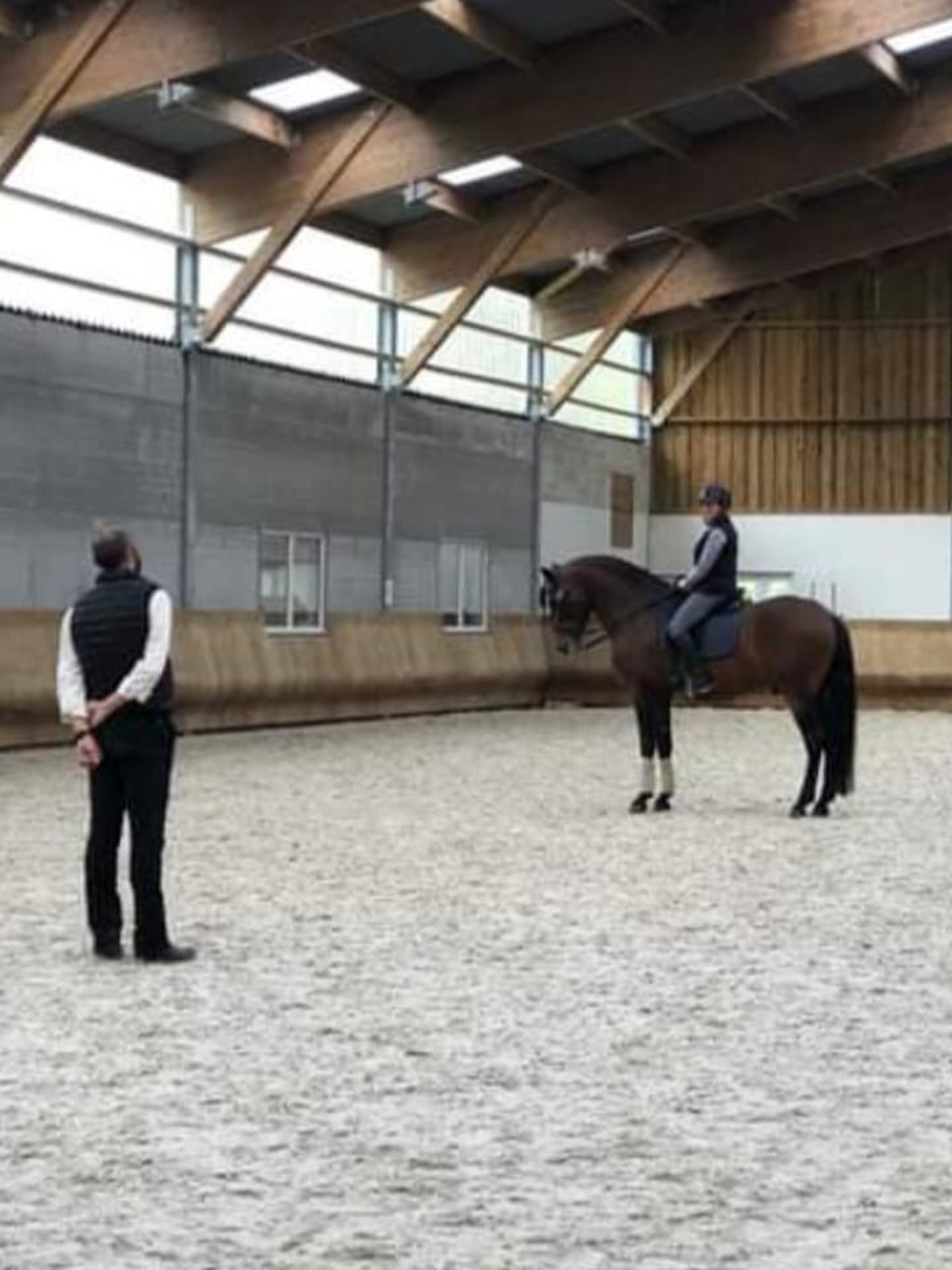 an abstract photo of a curved building with a blue sky in the background