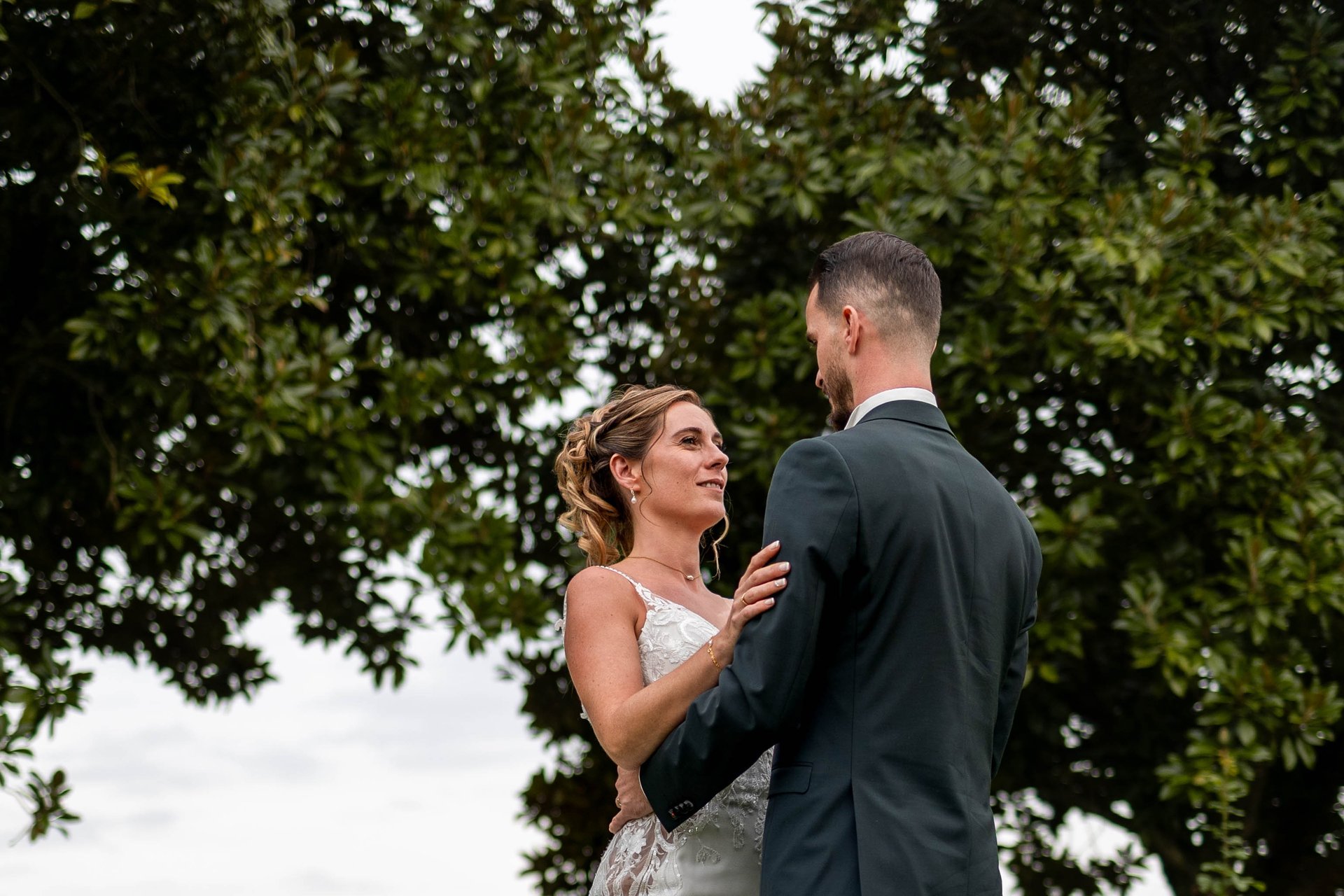 woman wearing yellow long-sleeved dress under white clouds and blue sky during daytime