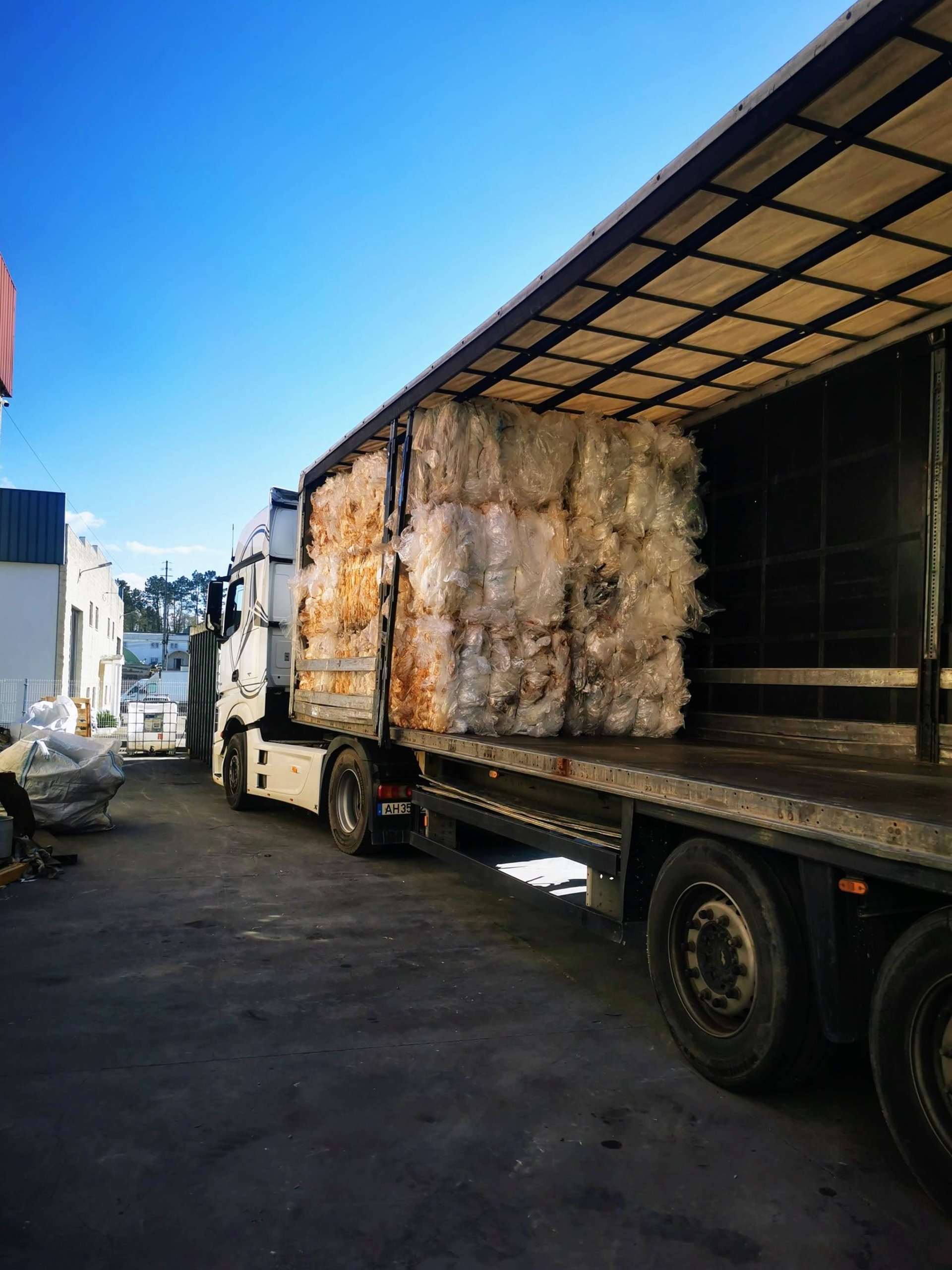 woman wearing yellow long-sleeved dress under white clouds and blue sky during daytime