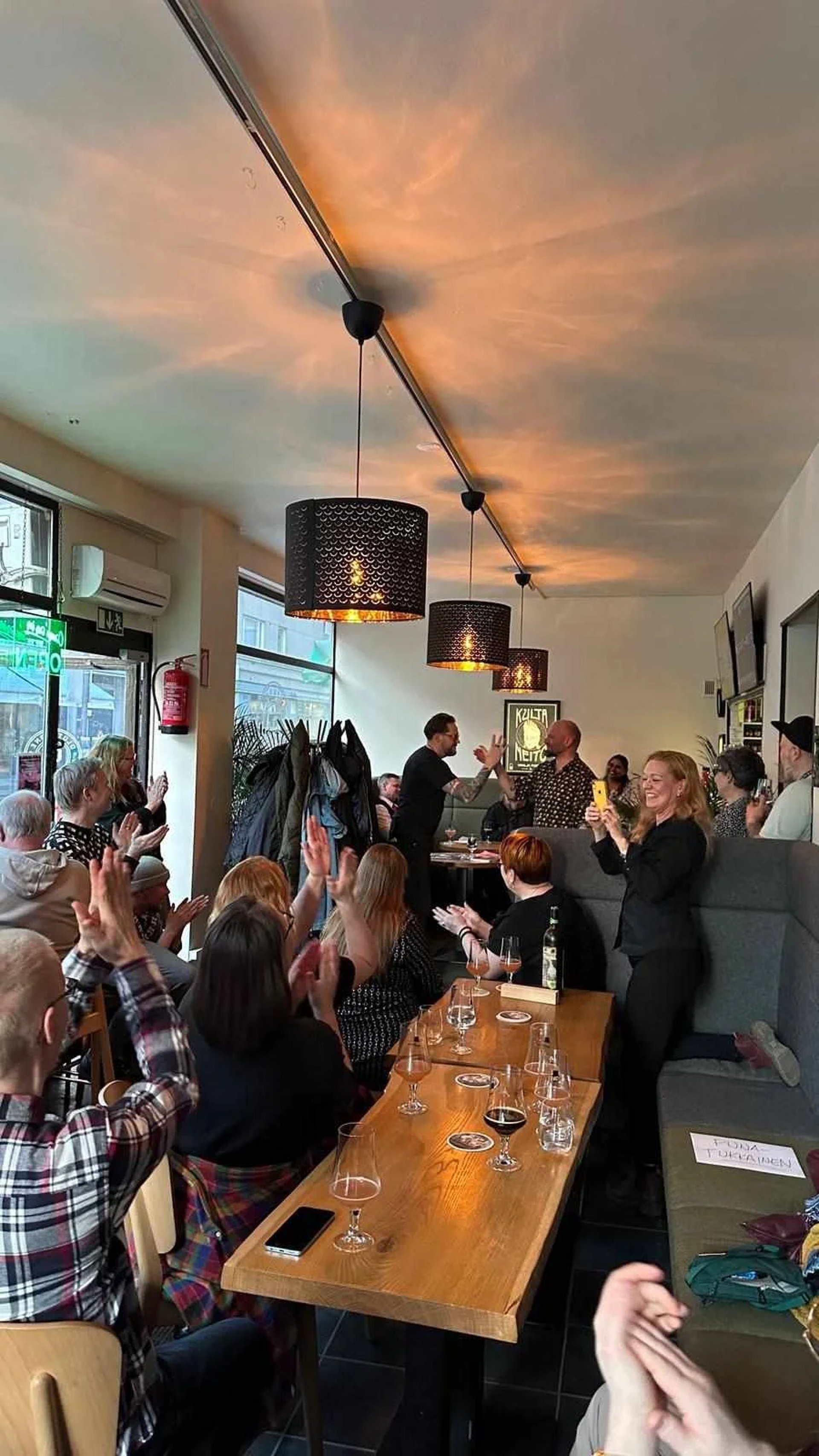 an abstract photo of a curved building with a blue sky in the background