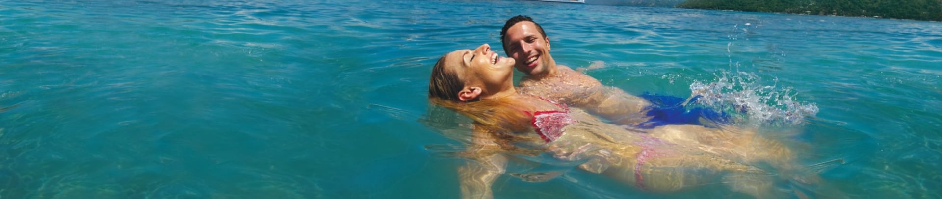 an abstract photo of a curved building with a blue sky in the background