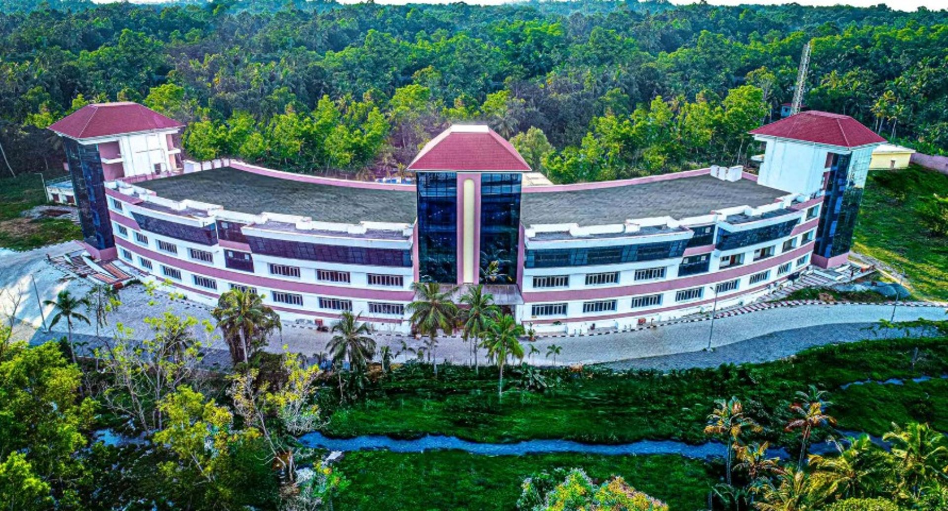 white and brown concrete building near body of water during night time