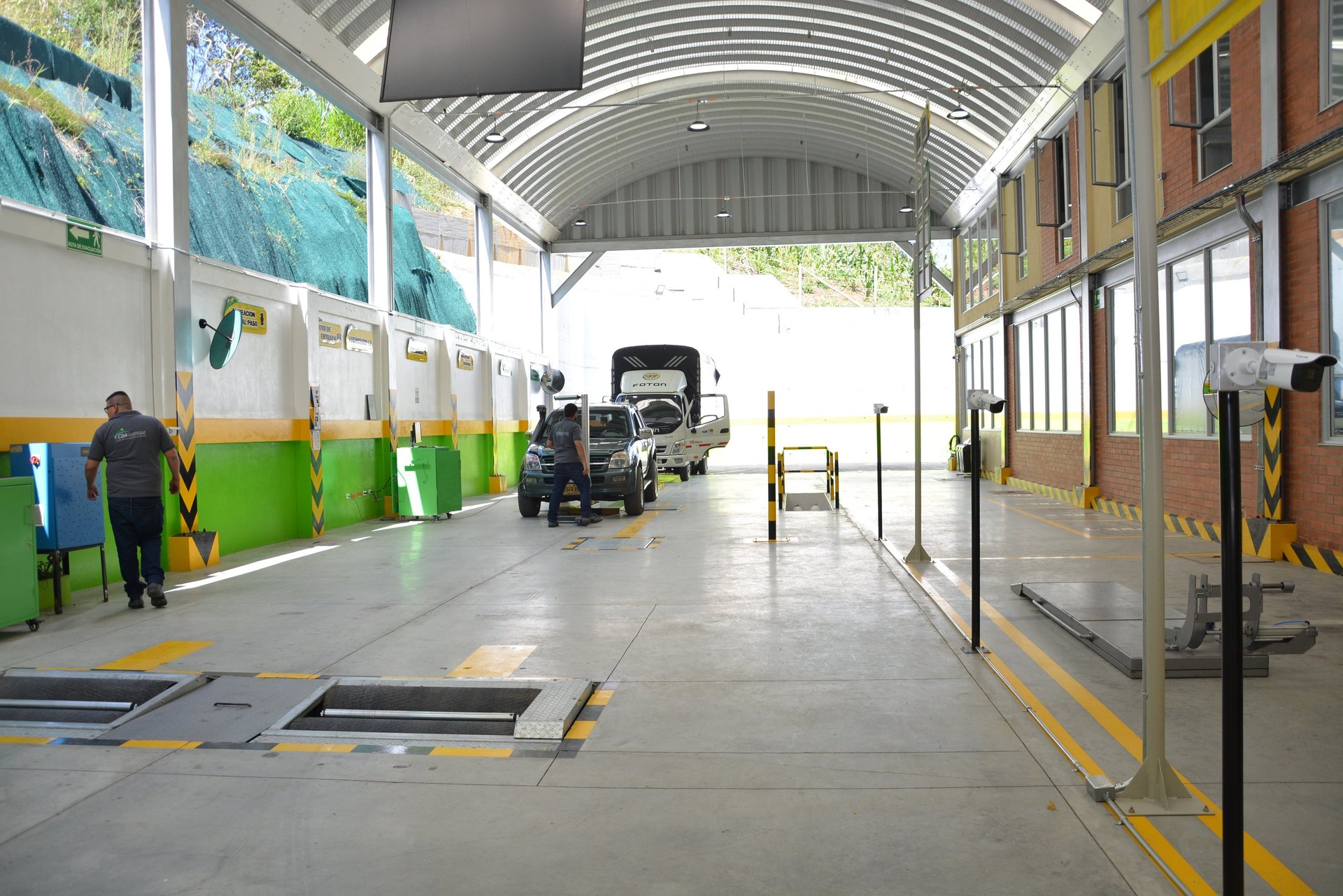 an abstract photo of a curved building with a blue sky in the background