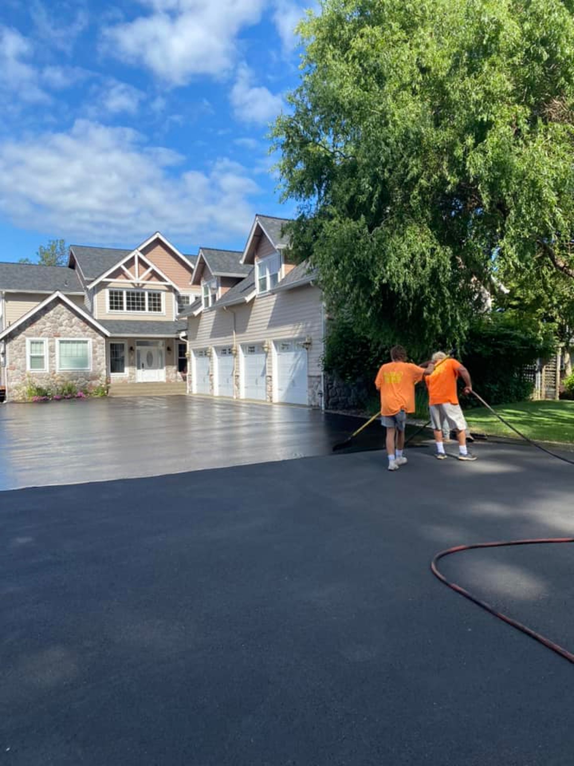 an abstract photo of a curved building with a blue sky in the background