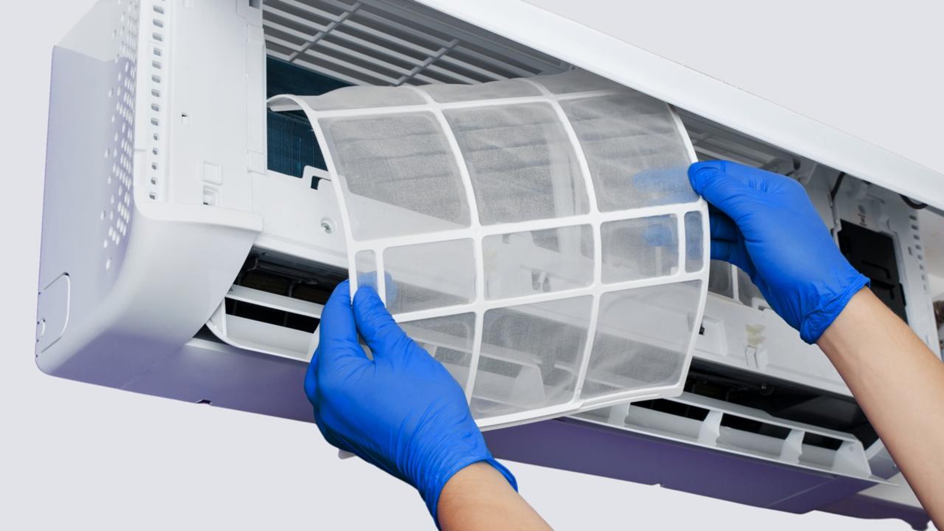 person holding black and silver dj controller