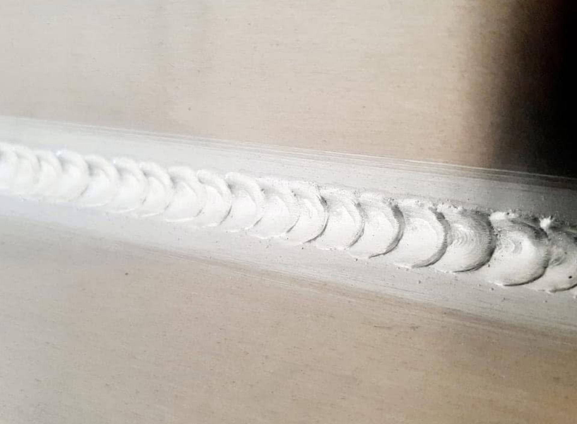 black and brown leather padded tub sofa