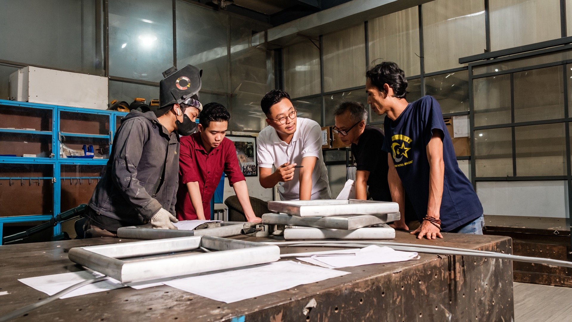 an abstract photo of a curved building with a blue sky in the background