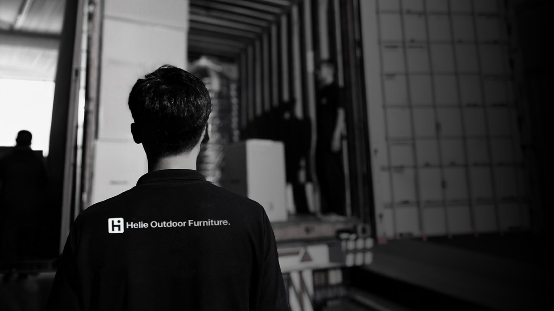 an abstract photo of a curved building with a blue sky in the background