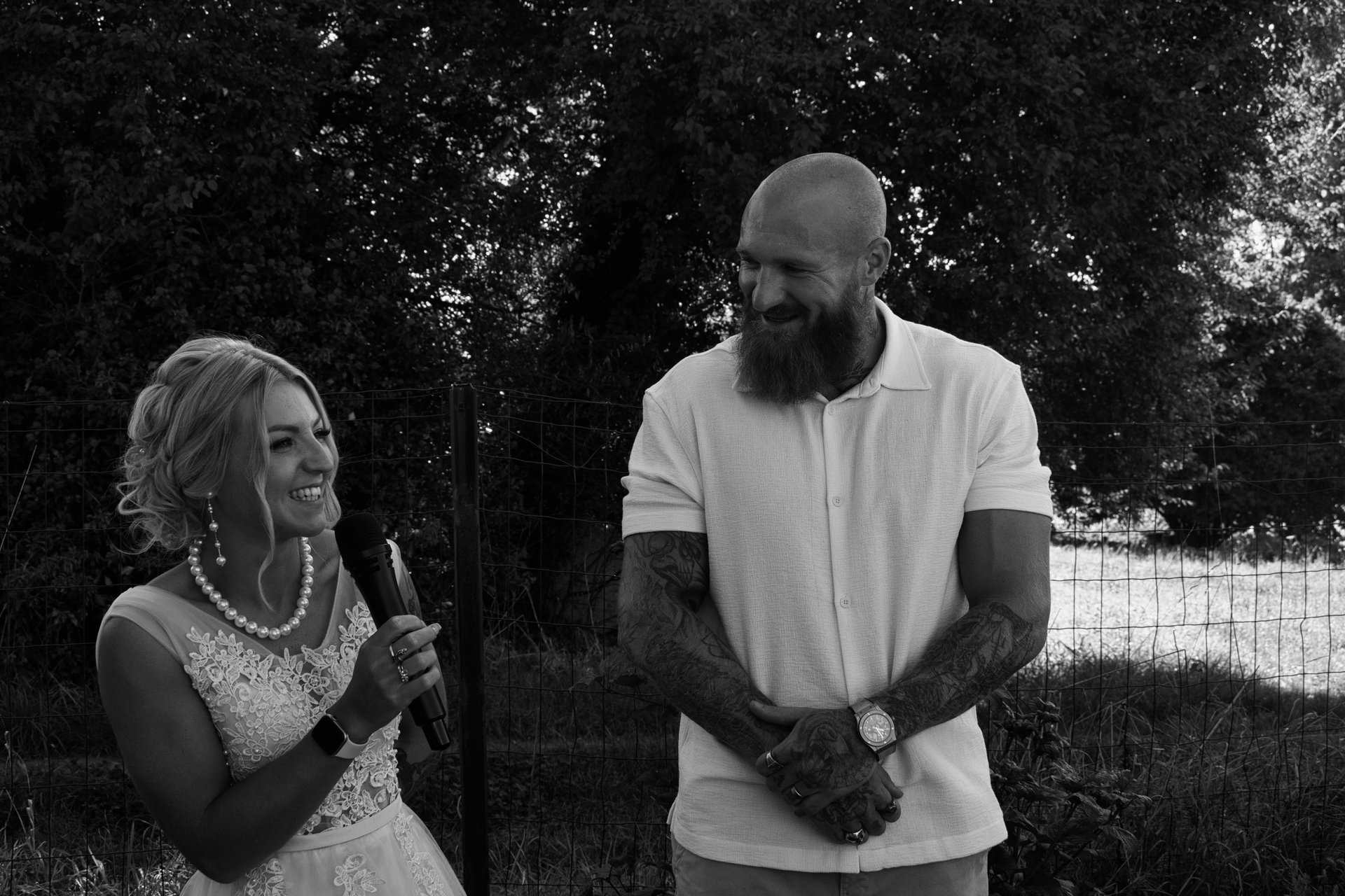 an abstract photo of a curved building with a blue sky in the background
