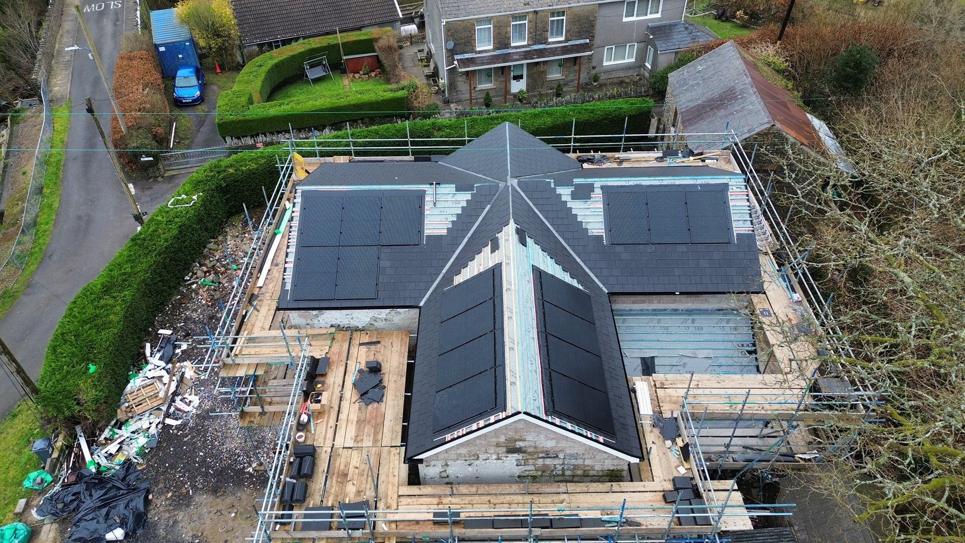 an abstract photo of a curved building with a blue sky in the background