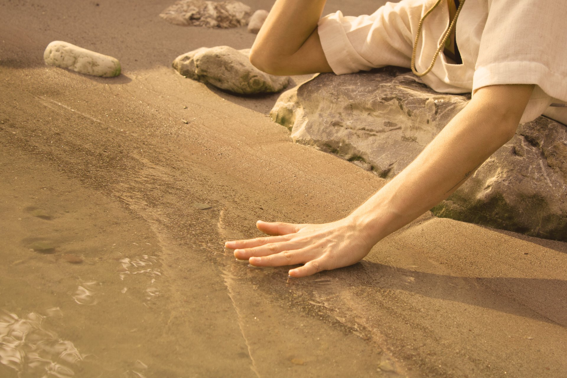 an abstract photo of a curved building with a blue sky in the background