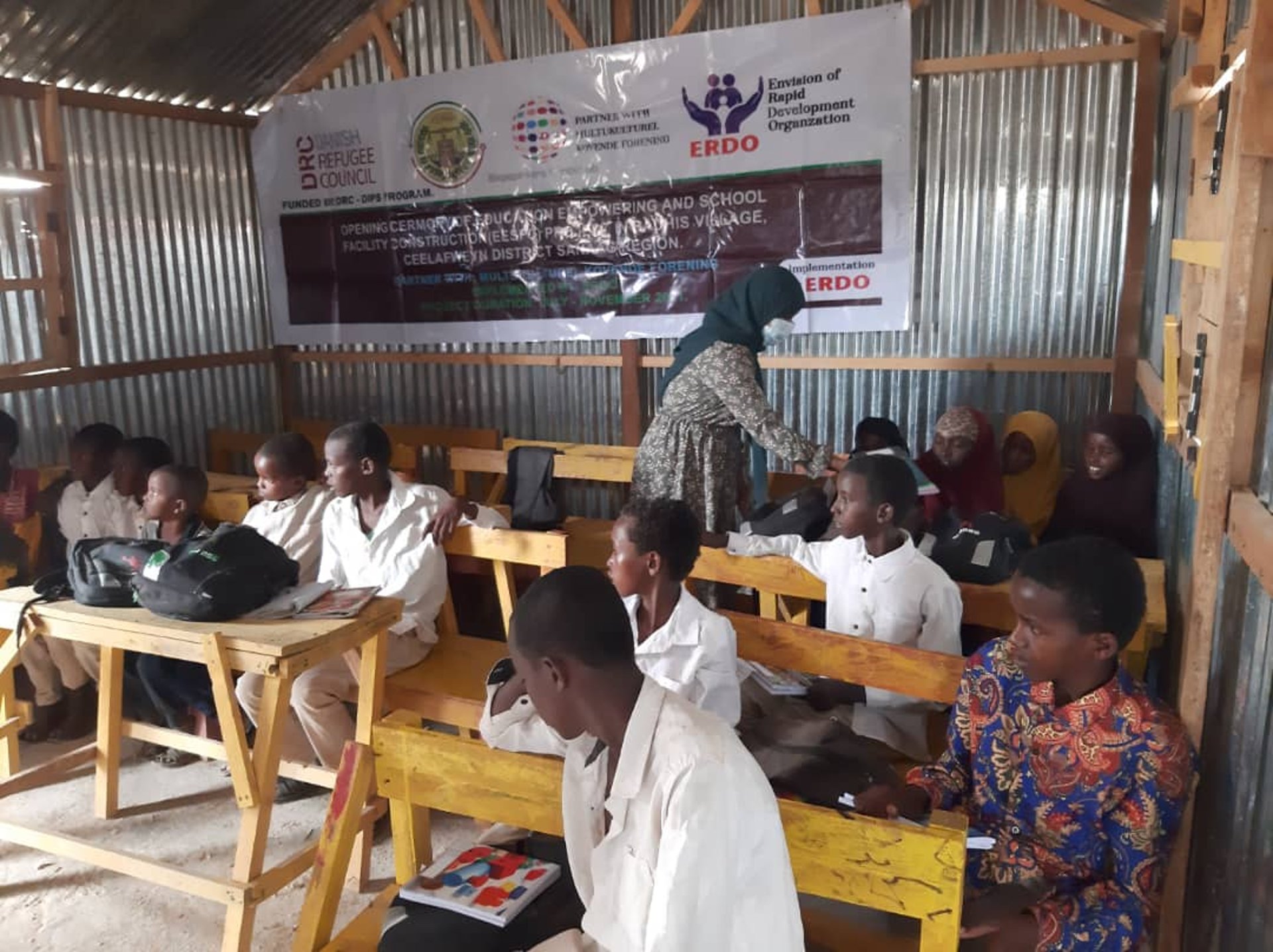 black and brown leather padded tub sofa