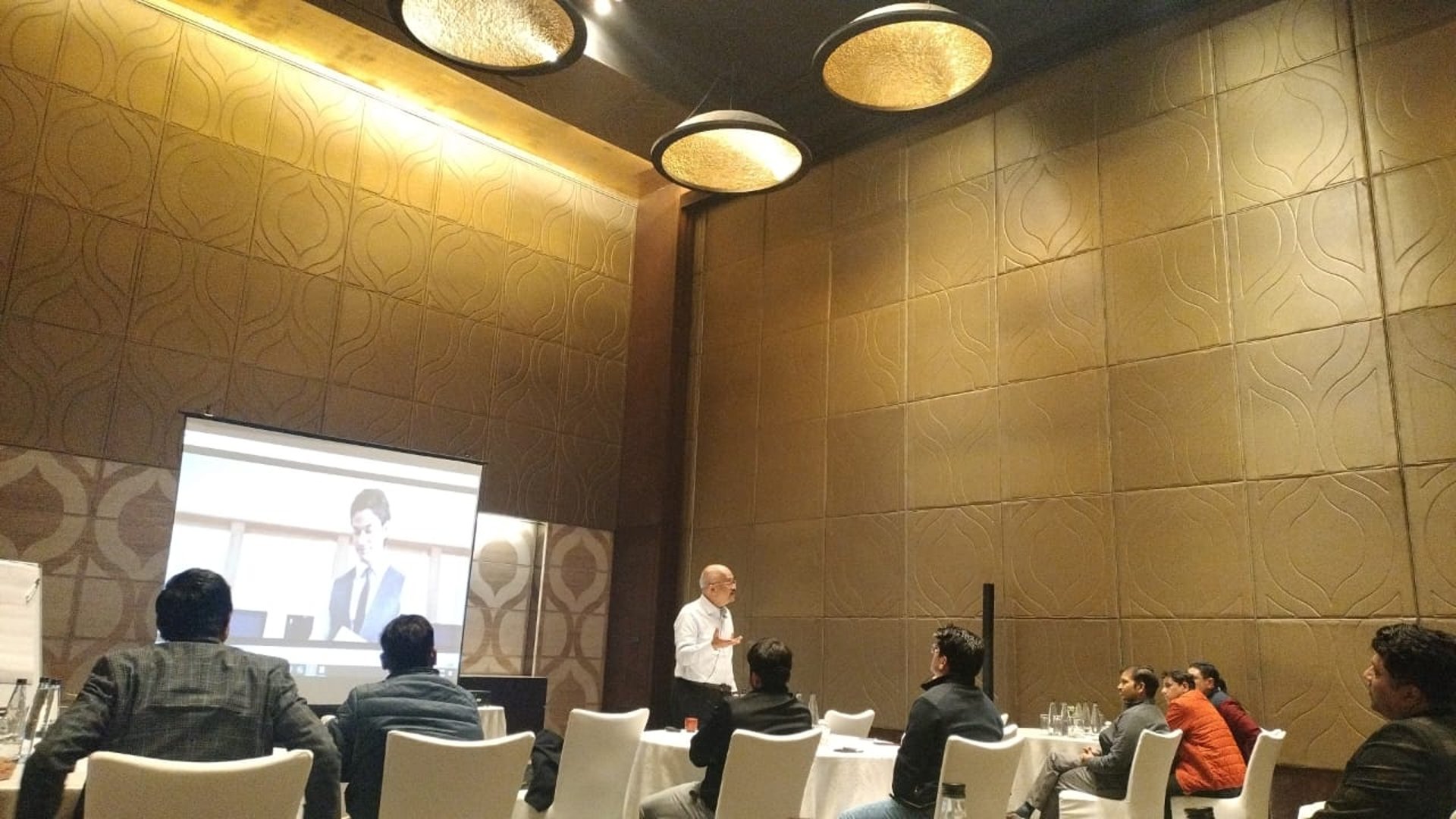 black and brown leather padded tub sofa