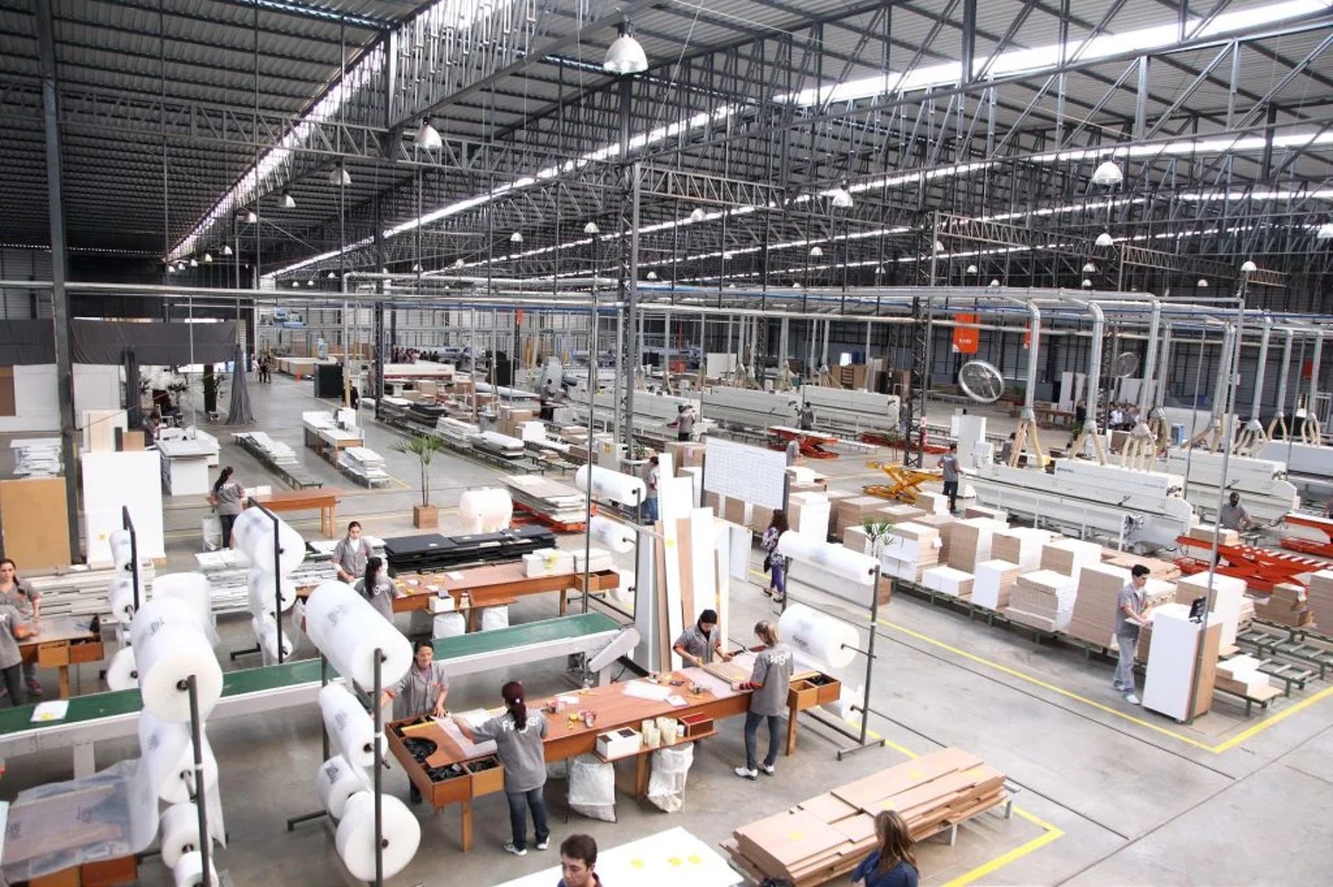 an abstract photo of a curved building with a blue sky in the background