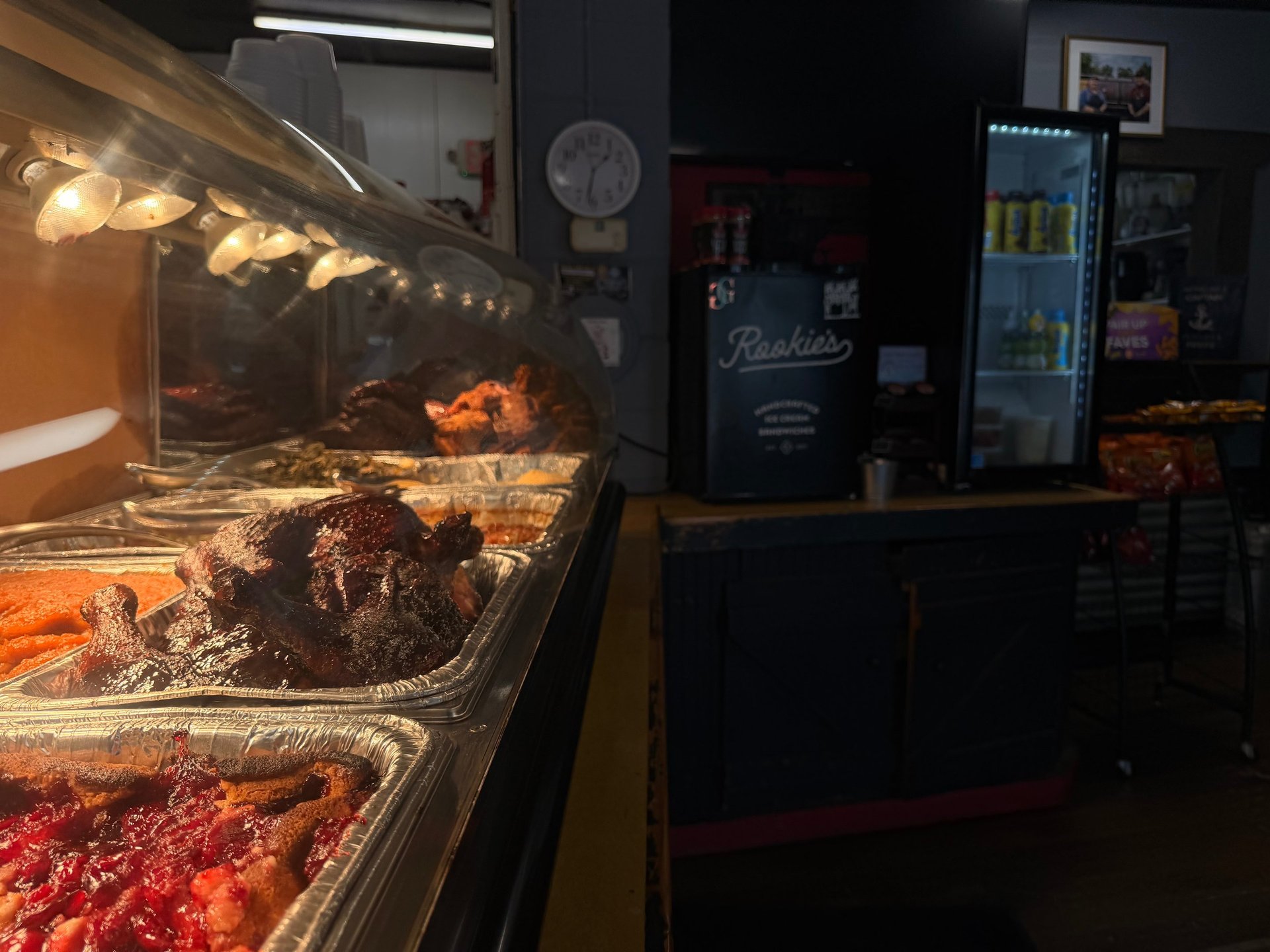 an abstract photo of a curved building with a blue sky in the background