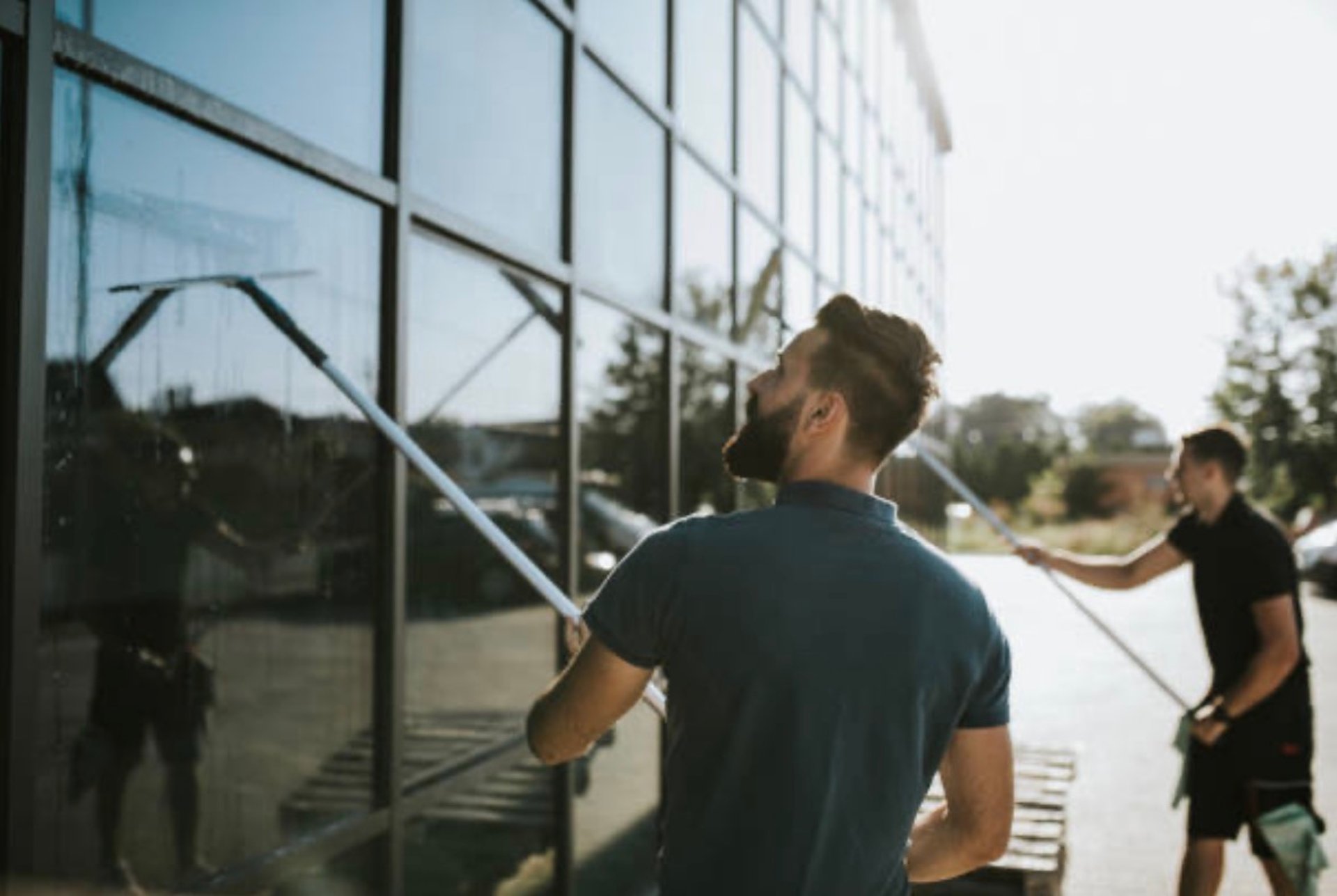 black and brown leather padded tub sofa