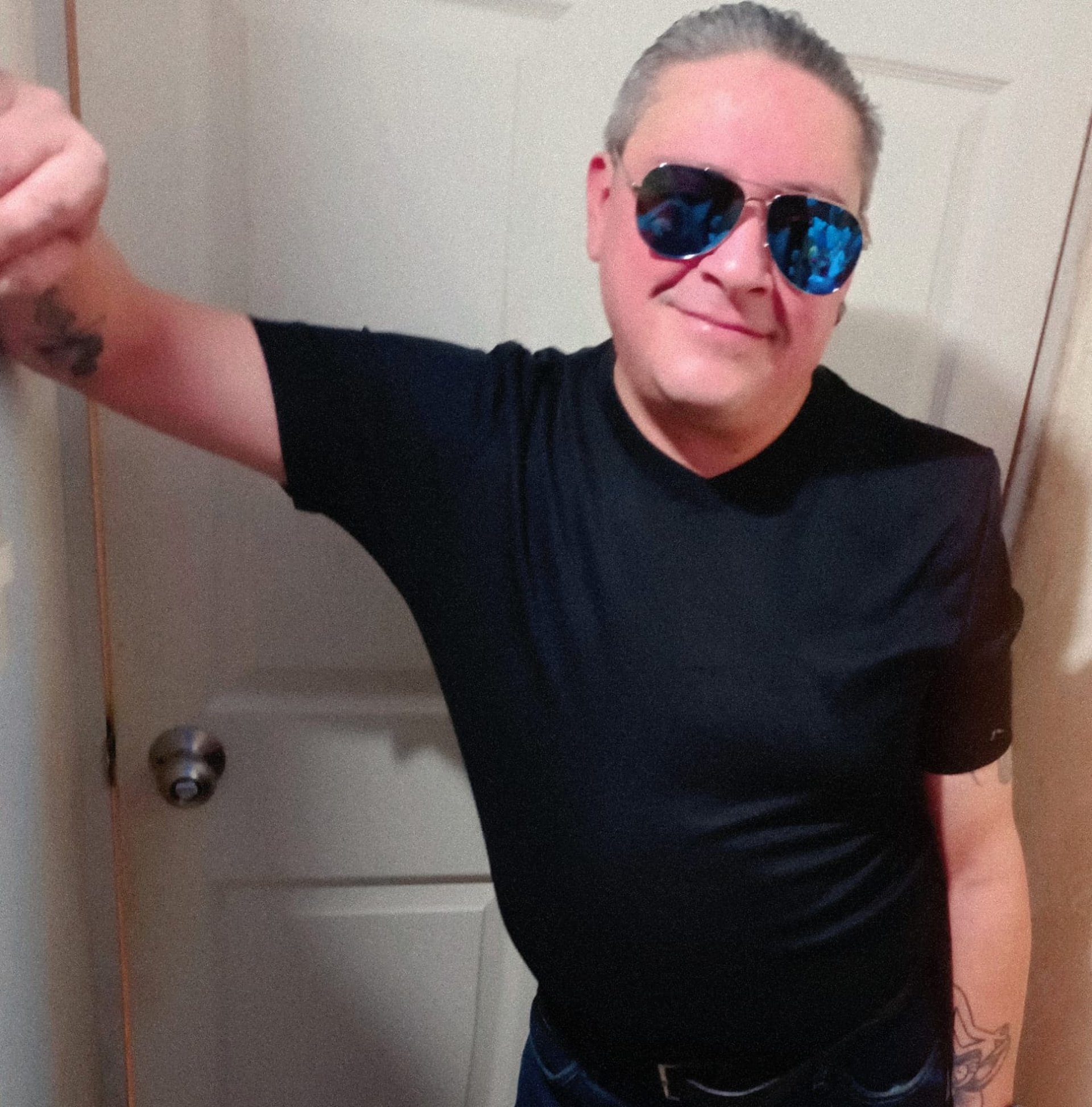 black and brown leather padded tub sofa