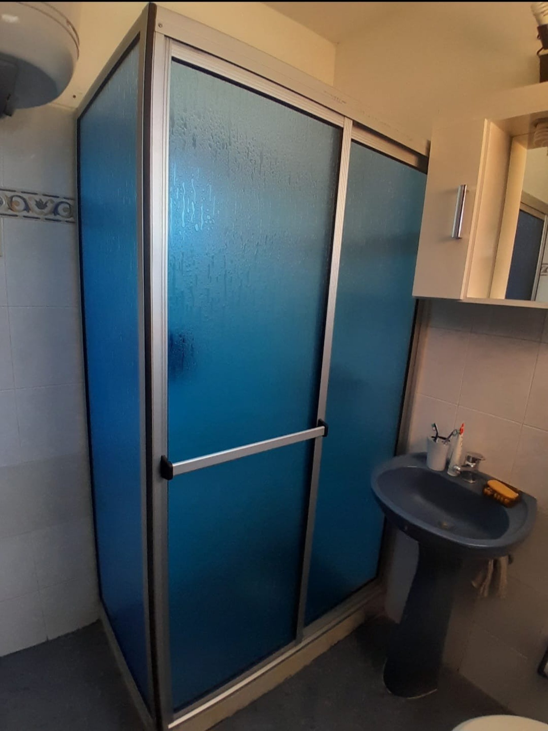 black and brown leather padded tub sofa