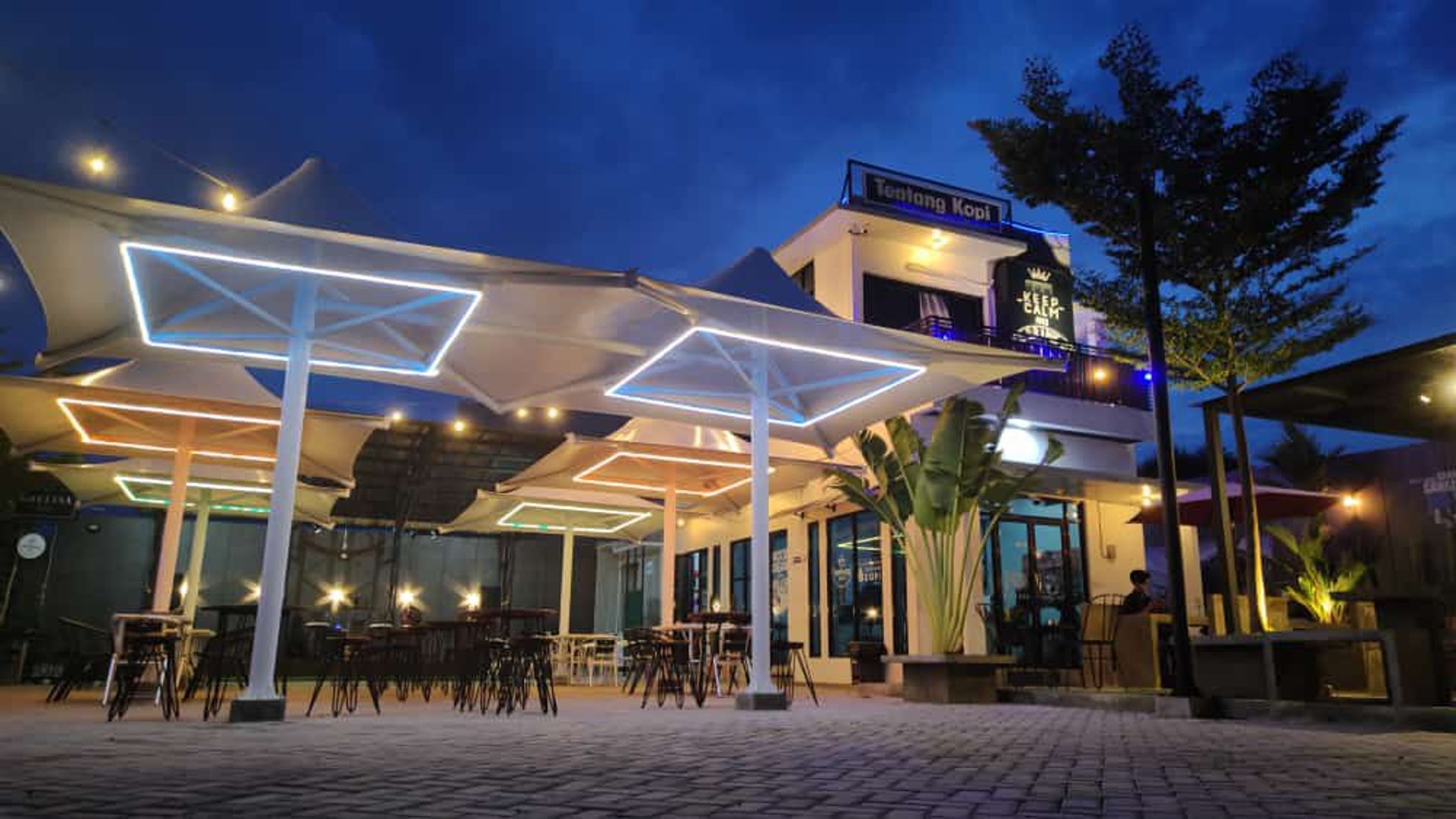woman wearing yellow long-sleeved dress under white clouds and blue sky during daytime