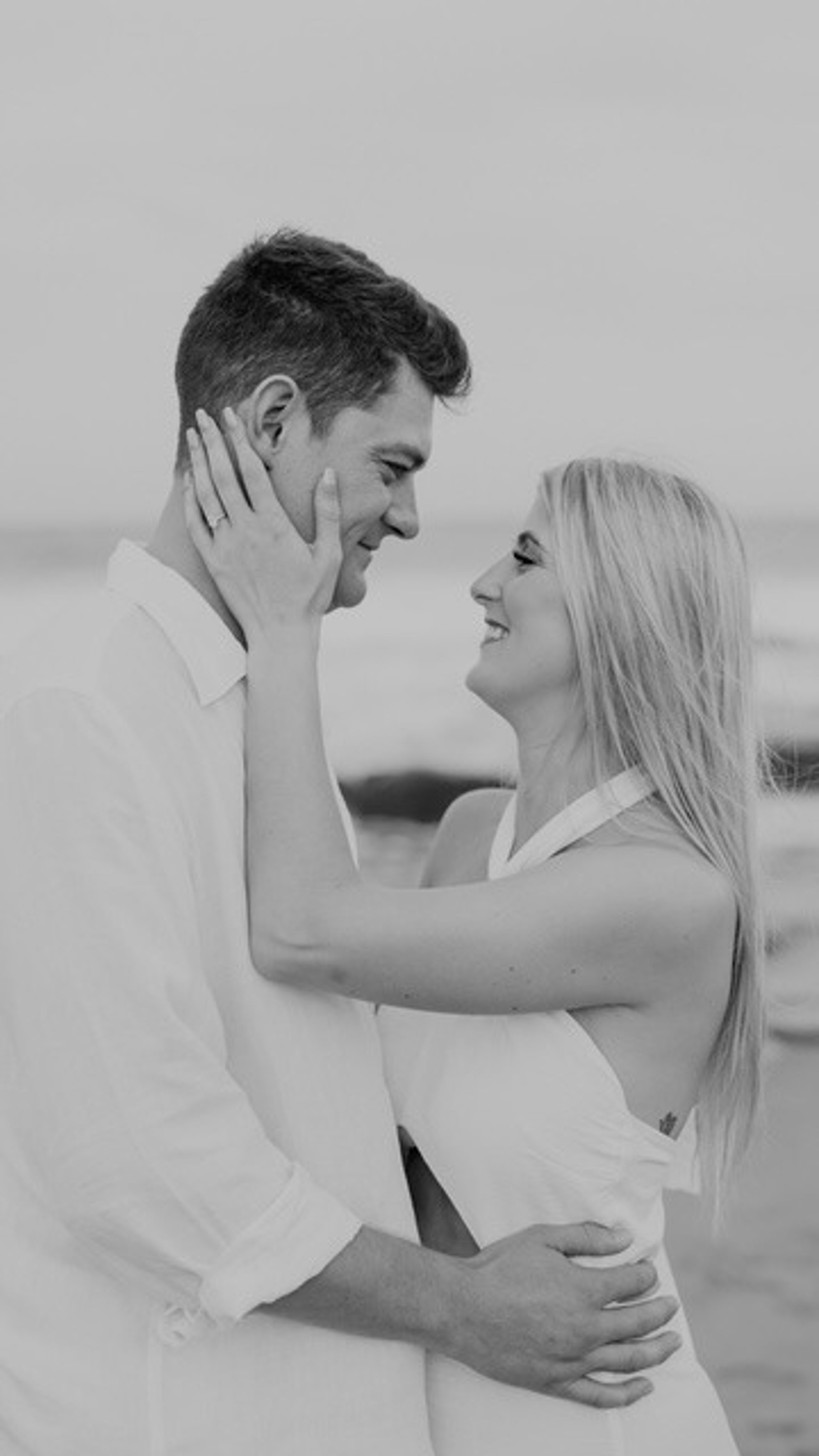 couple wearing silver-colored rings