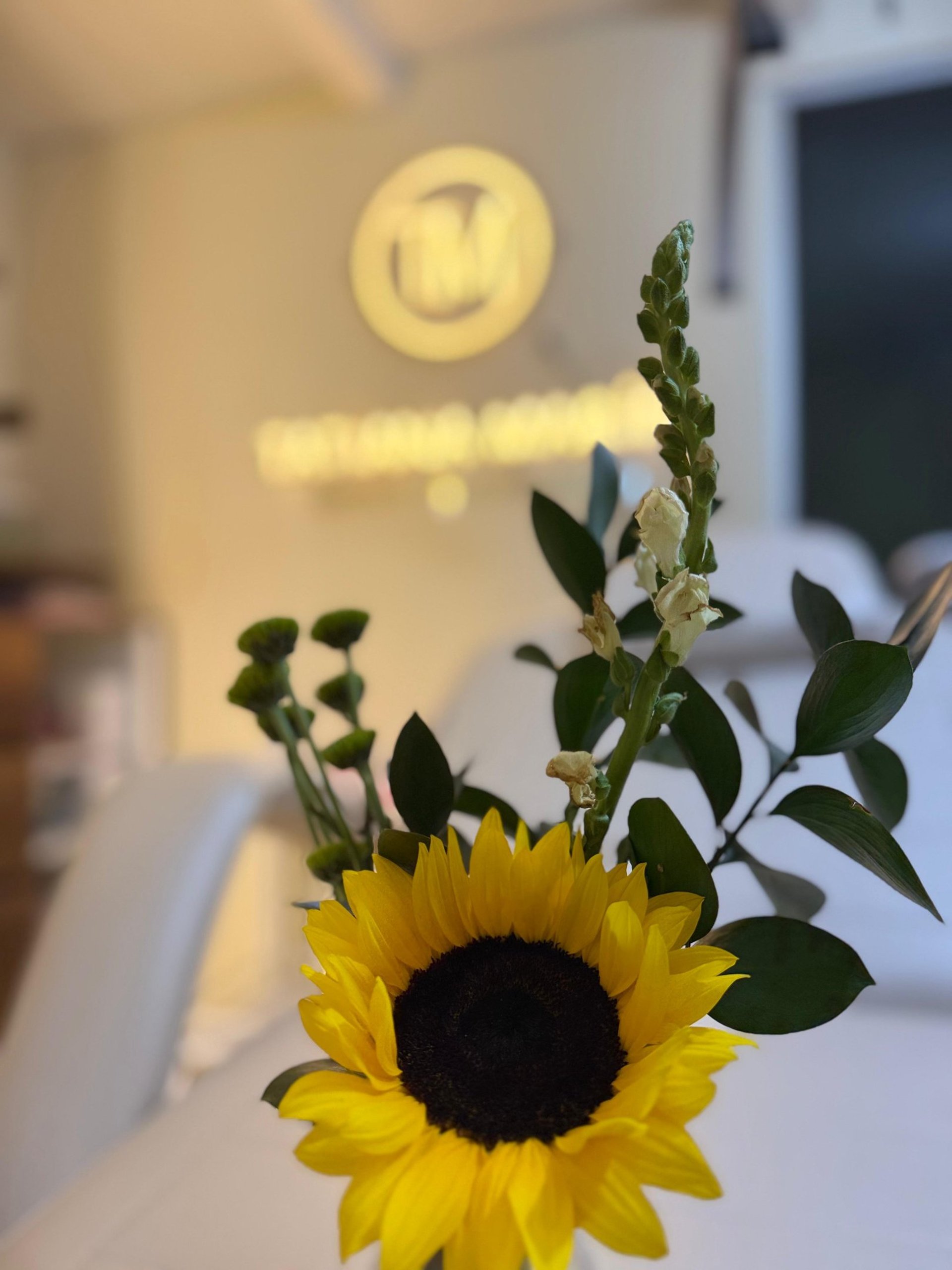a white bowl sitting on top of a wooden table