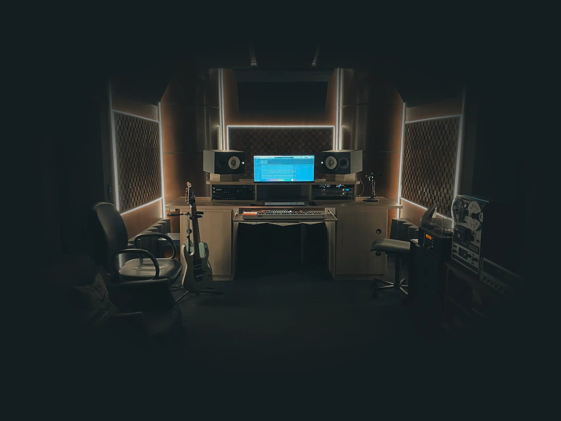 black and brown leather padded tub sofa