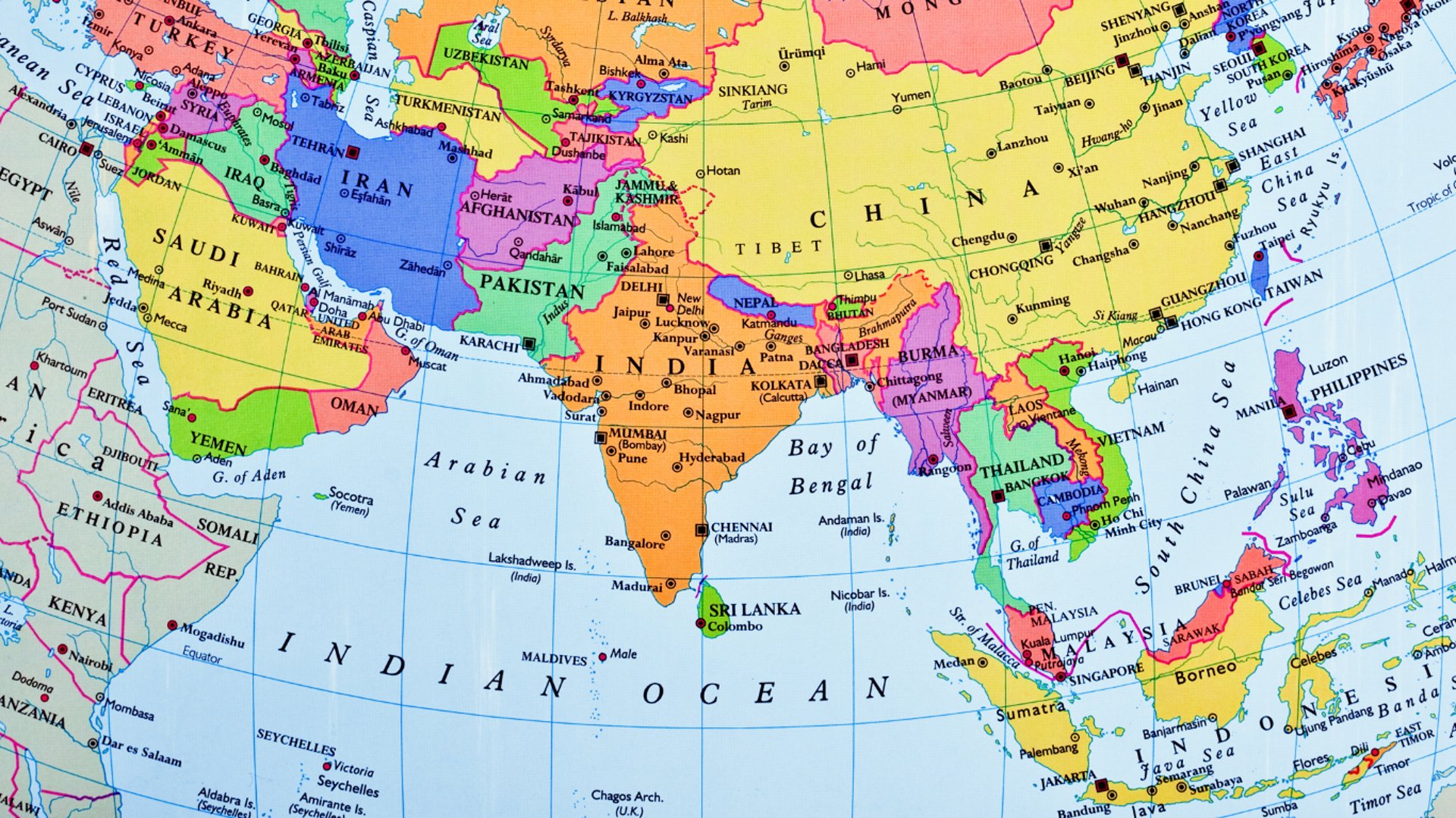 black and brown leather padded tub sofa