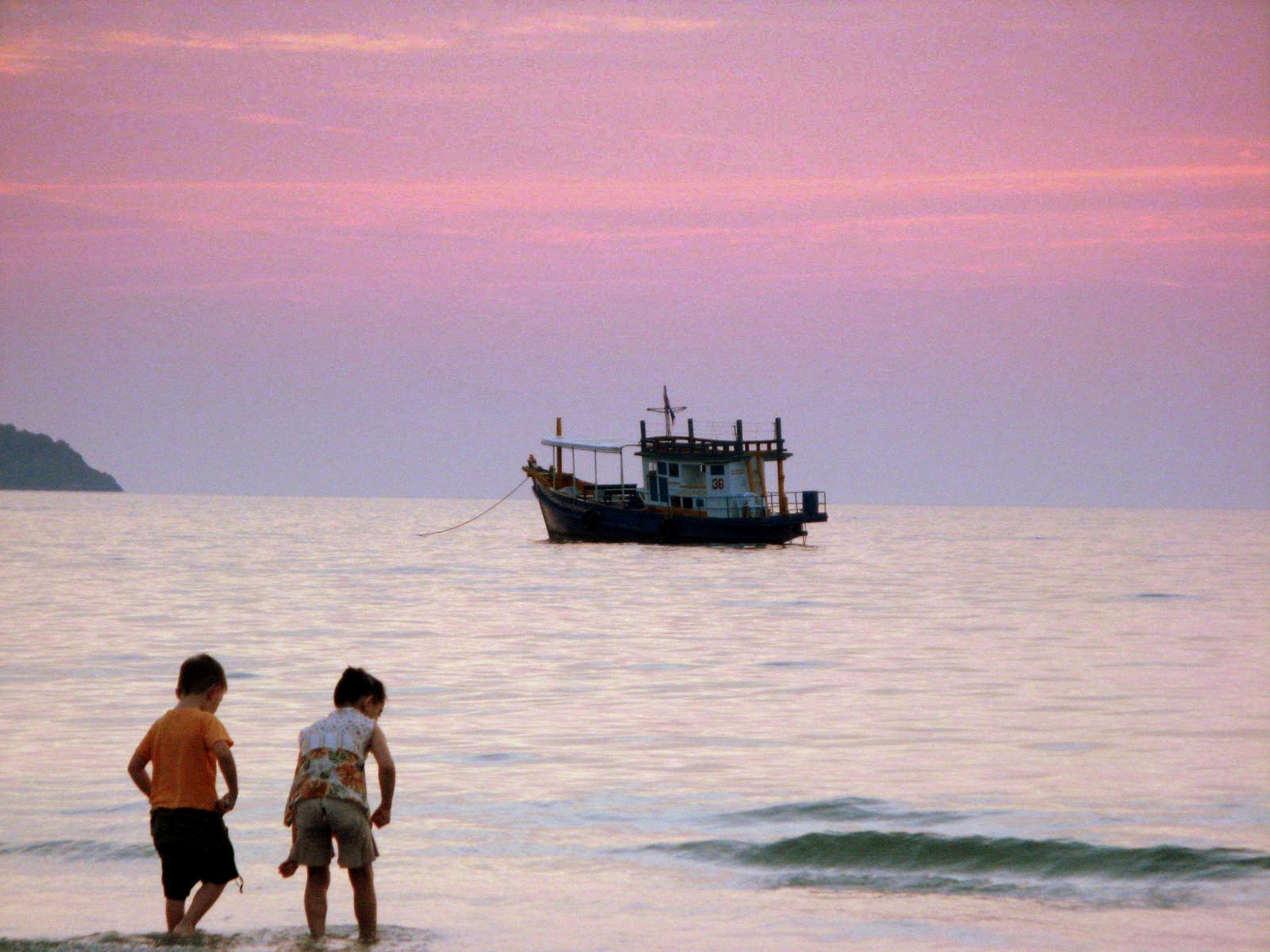 black and brown leather padded tub sofa