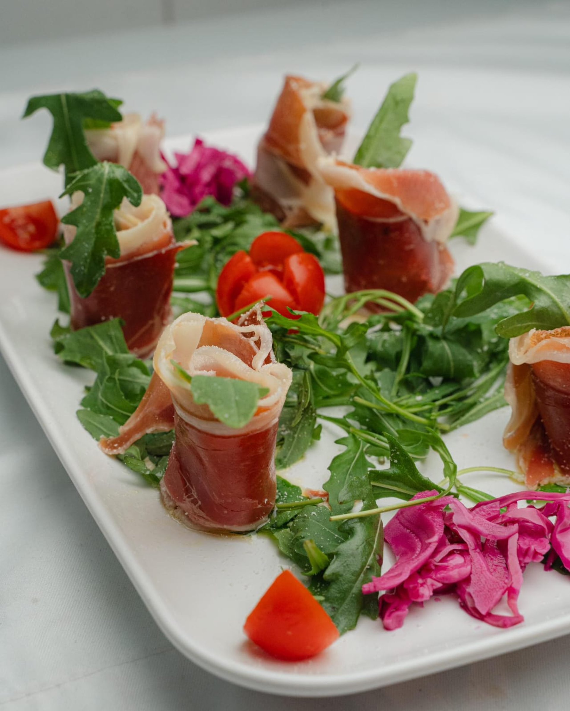 woman wearing yellow long-sleeved dress under white clouds and blue sky during daytime