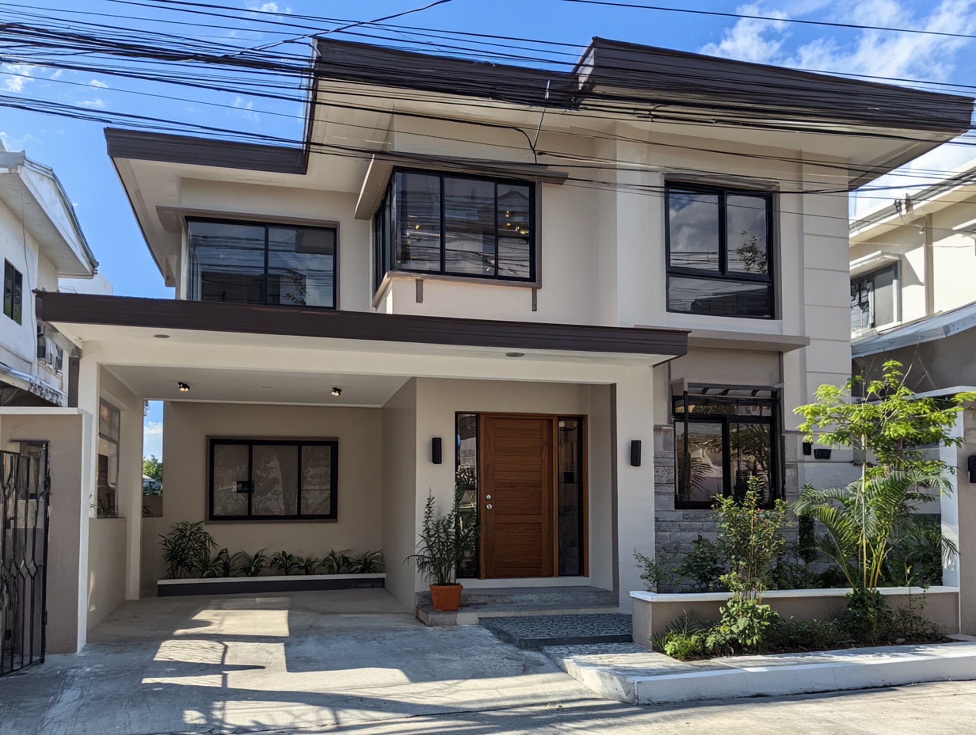 black and brown leather padded tub sofa