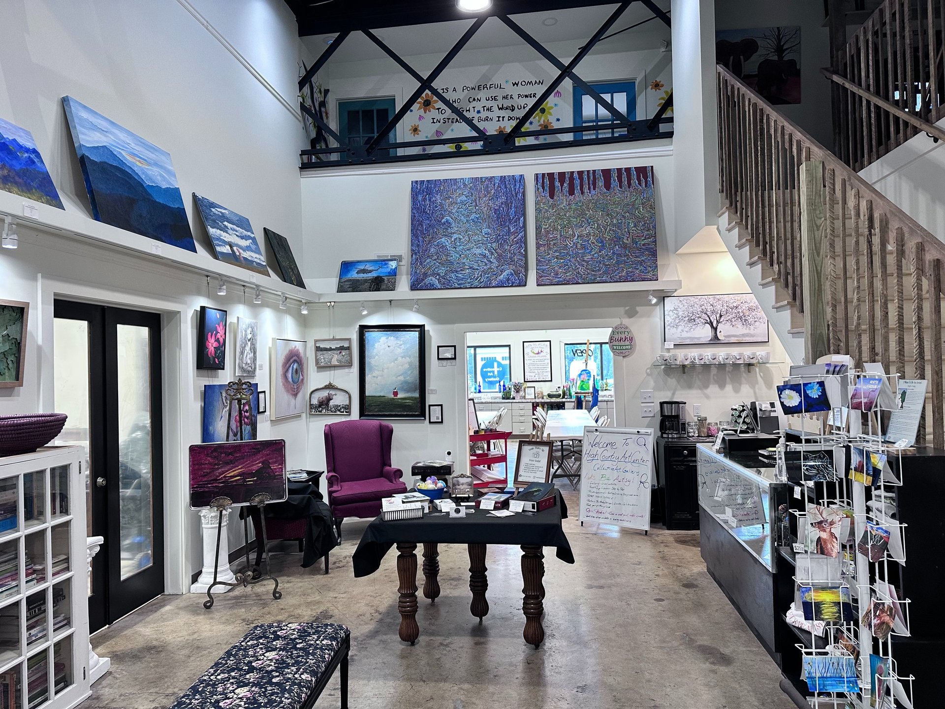 black and brown leather padded tub sofa
