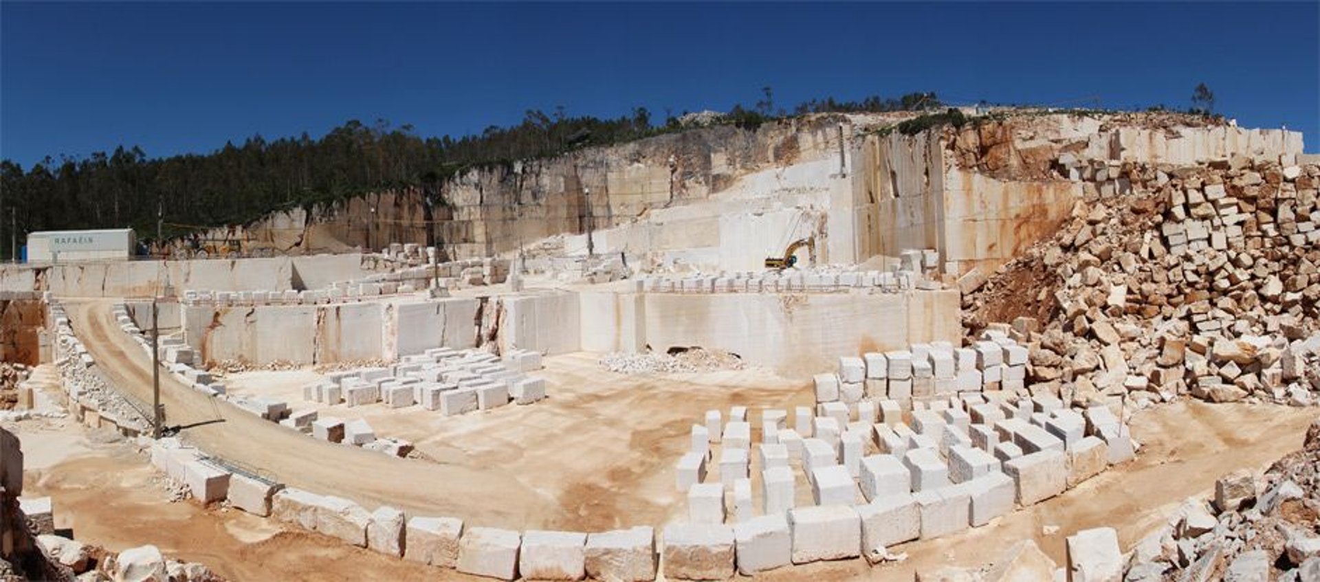 A pile of rocks sitting on top of a pile of gravel