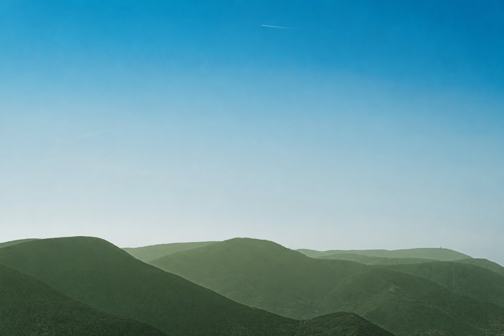 mountain range under blue sky