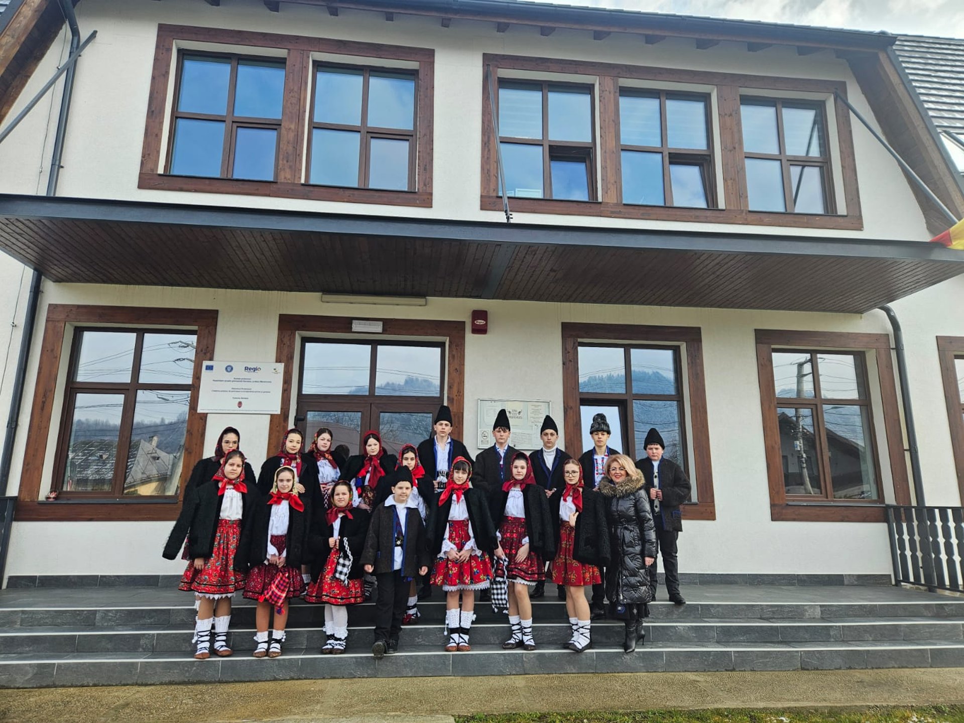 an abstract photo of a curved building with a blue sky in the background