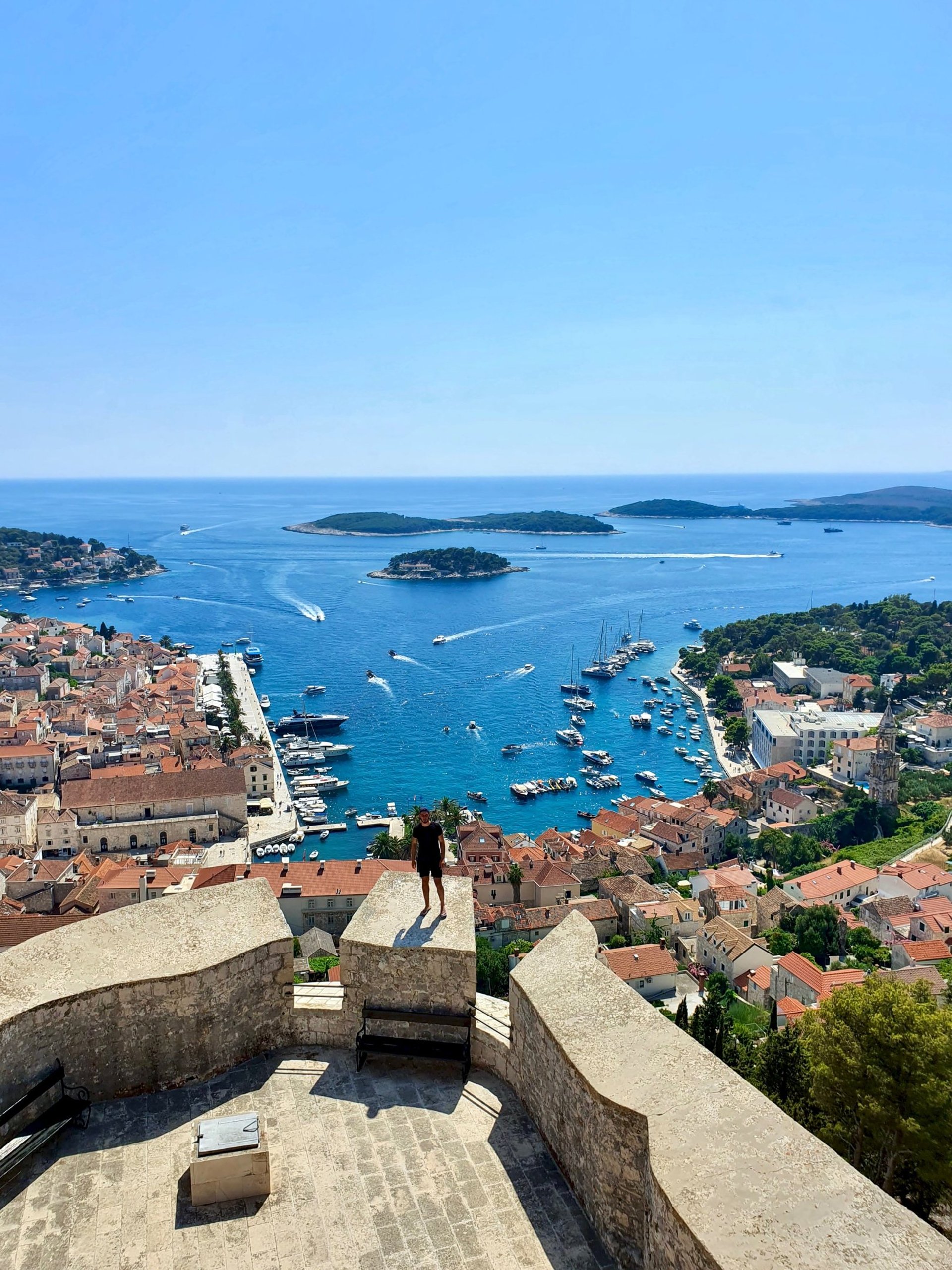 Guest at Fortica Fortress in Hvar overlooking Hvar town and Pakleni Islands during private boat tour from Split.
