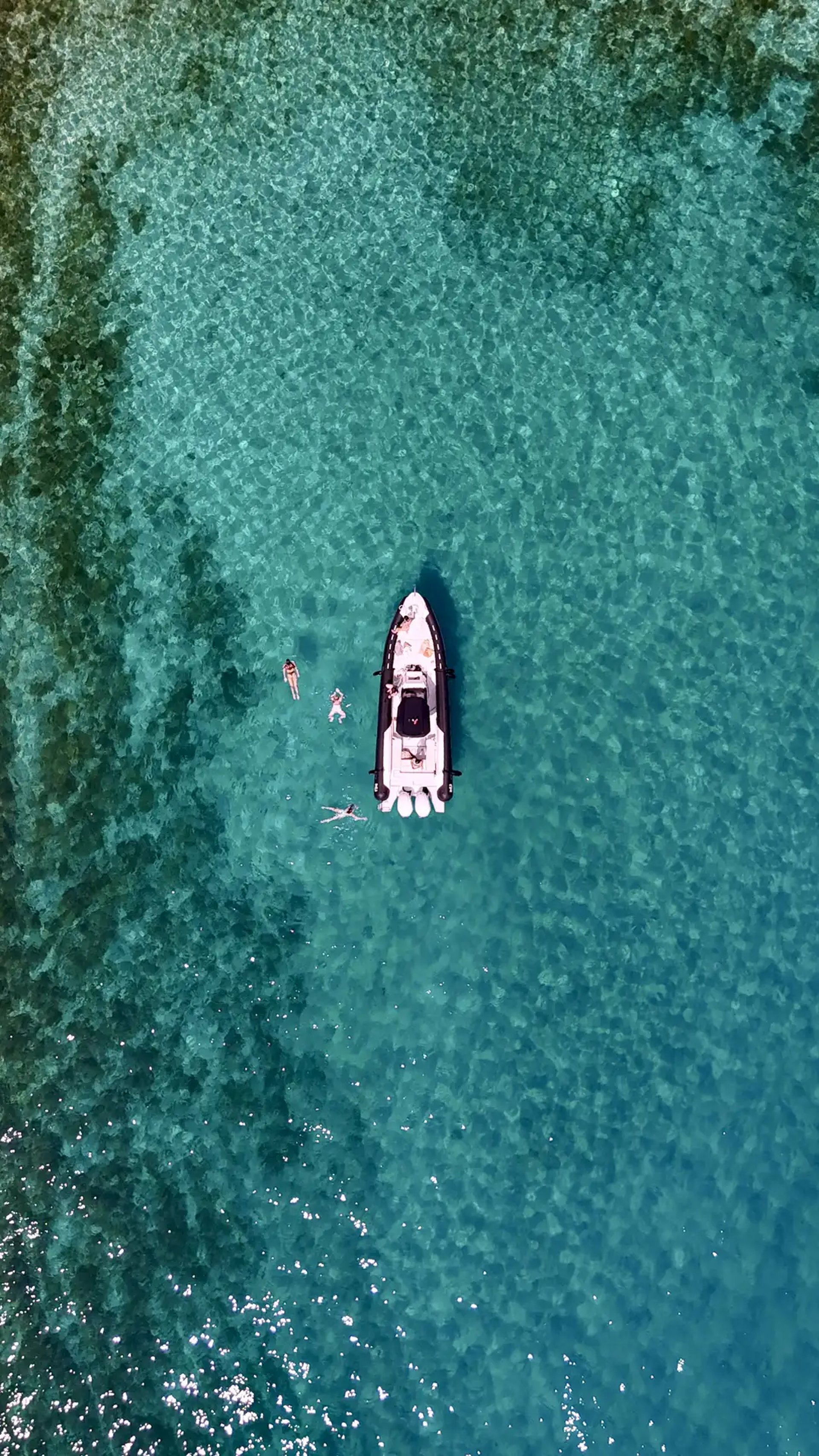 Nuova Jolly speedboat in Milna, Brac. Girls enjoying a private boat tour from Split with SunMarine.