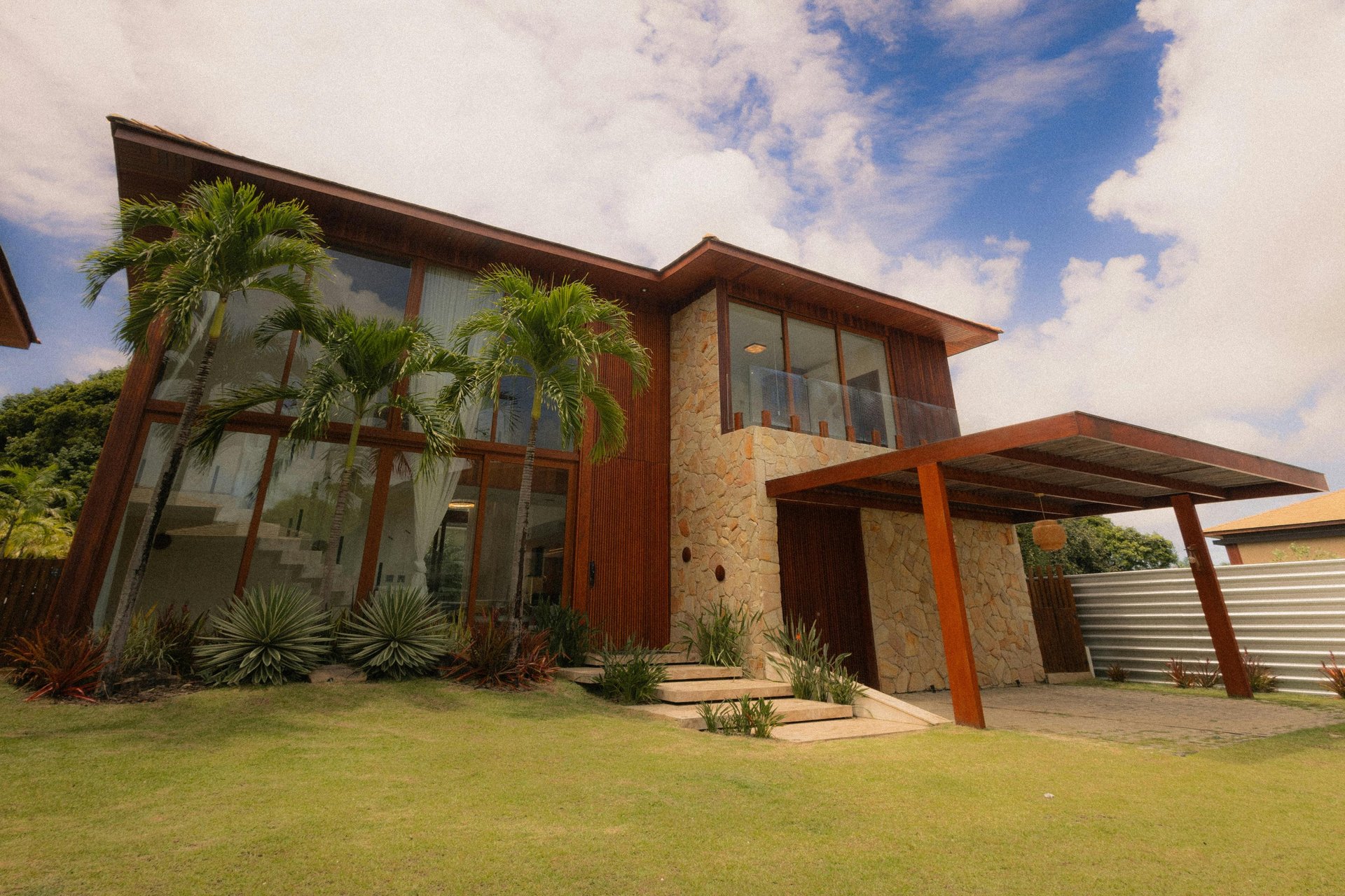 brown wooden framed yellow padded chair