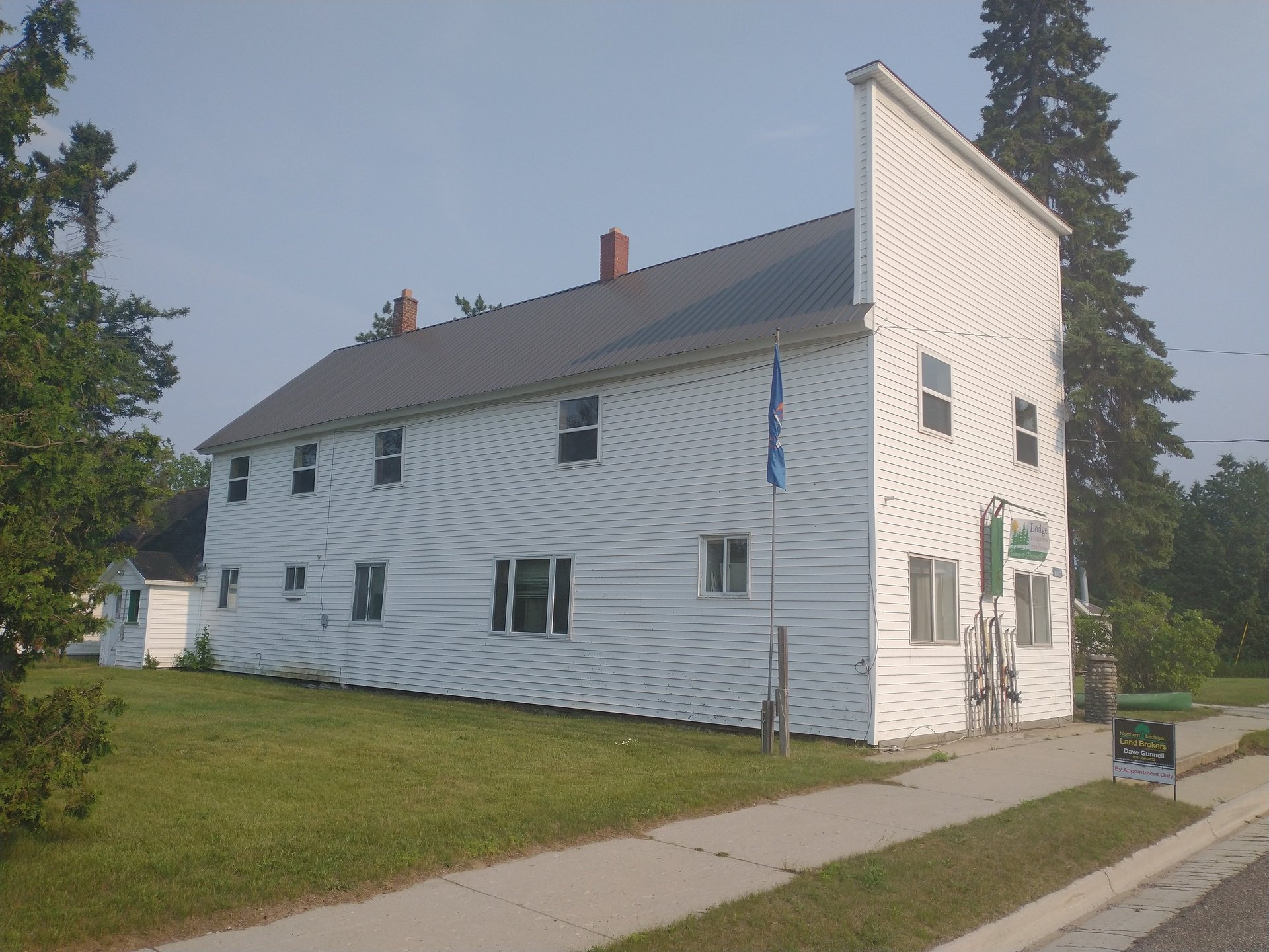 black and brown leather padded tub sofa